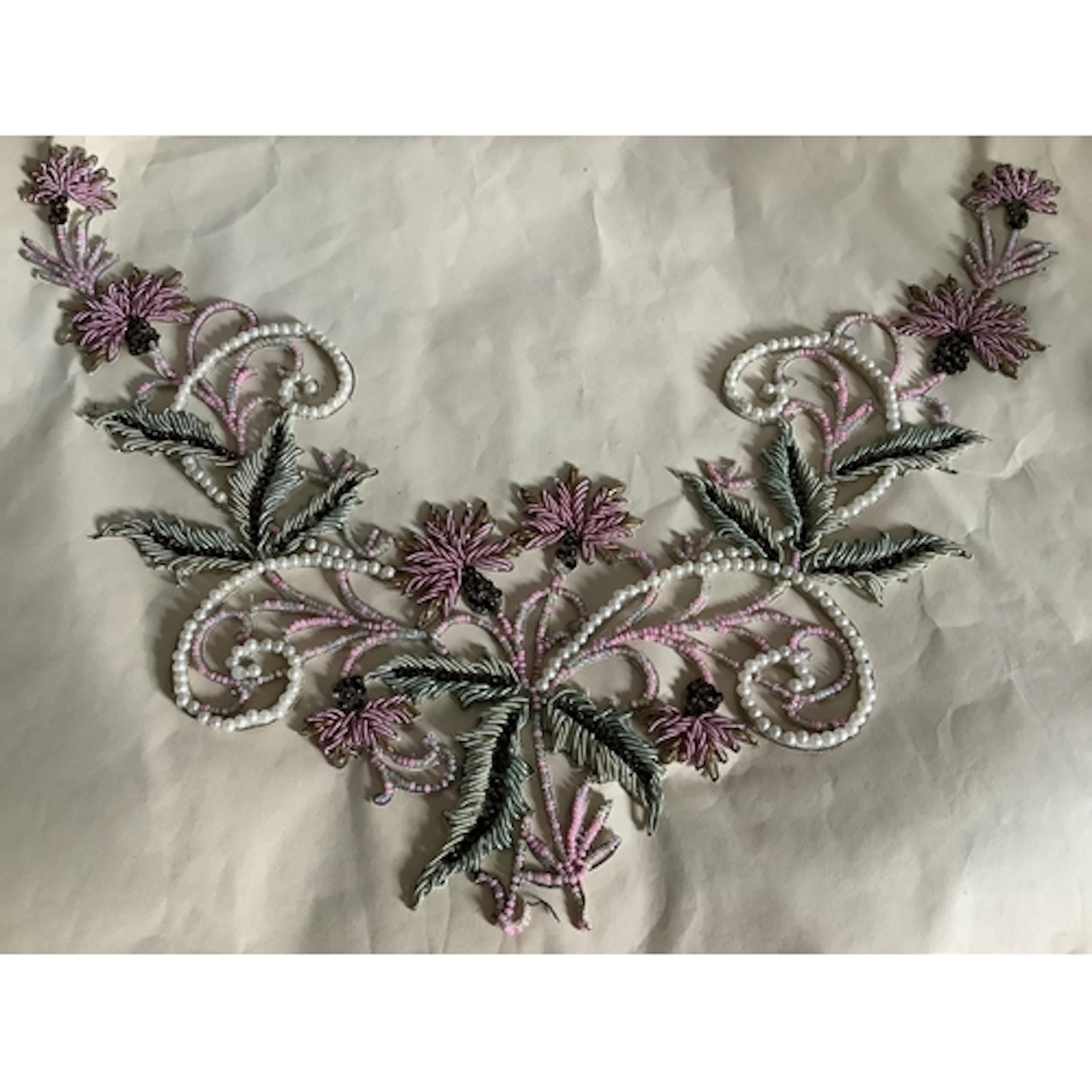 A collection of beaded and sequin appliqués, to include an e...