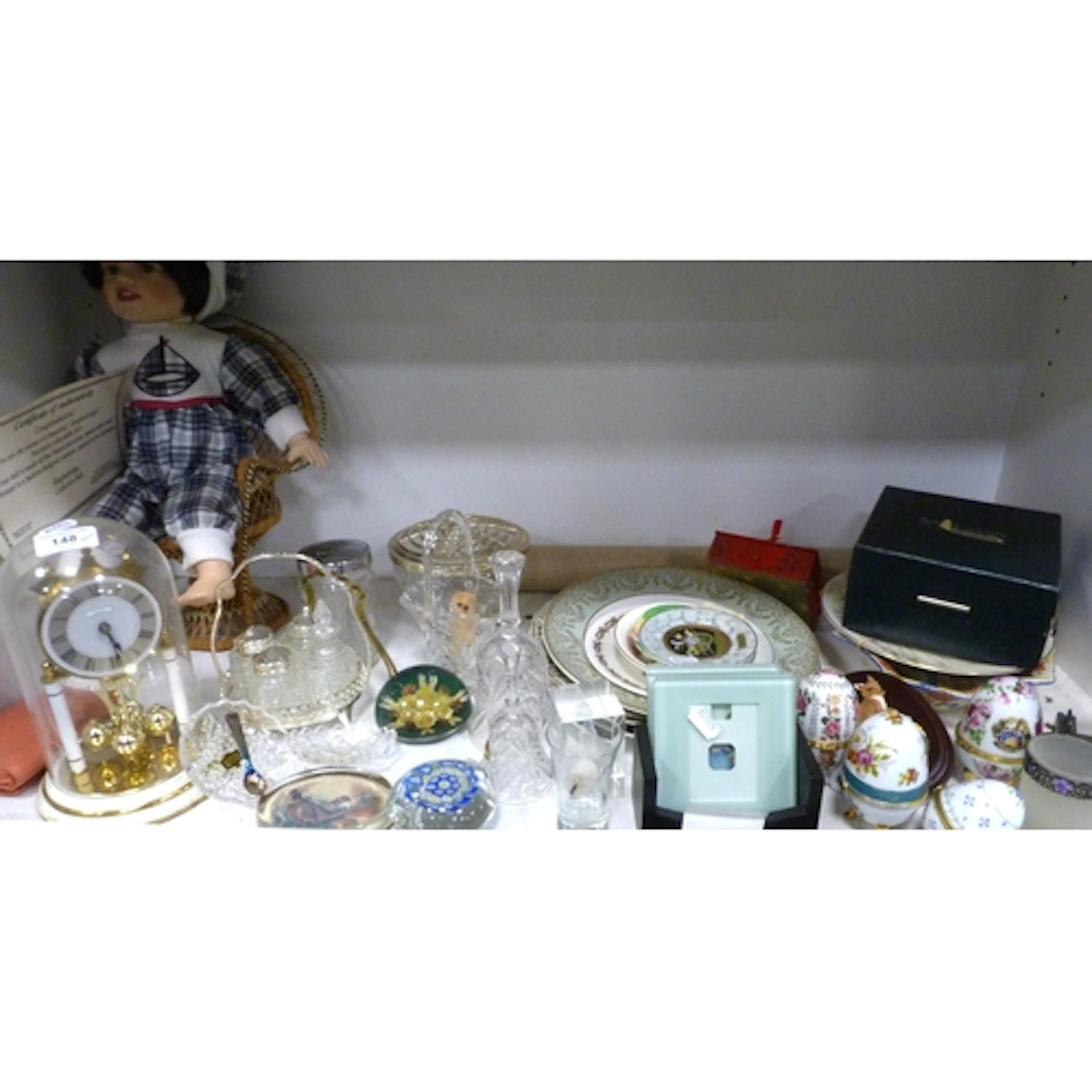 Shelf of sundries to include Anniversary clock, plates, trin...