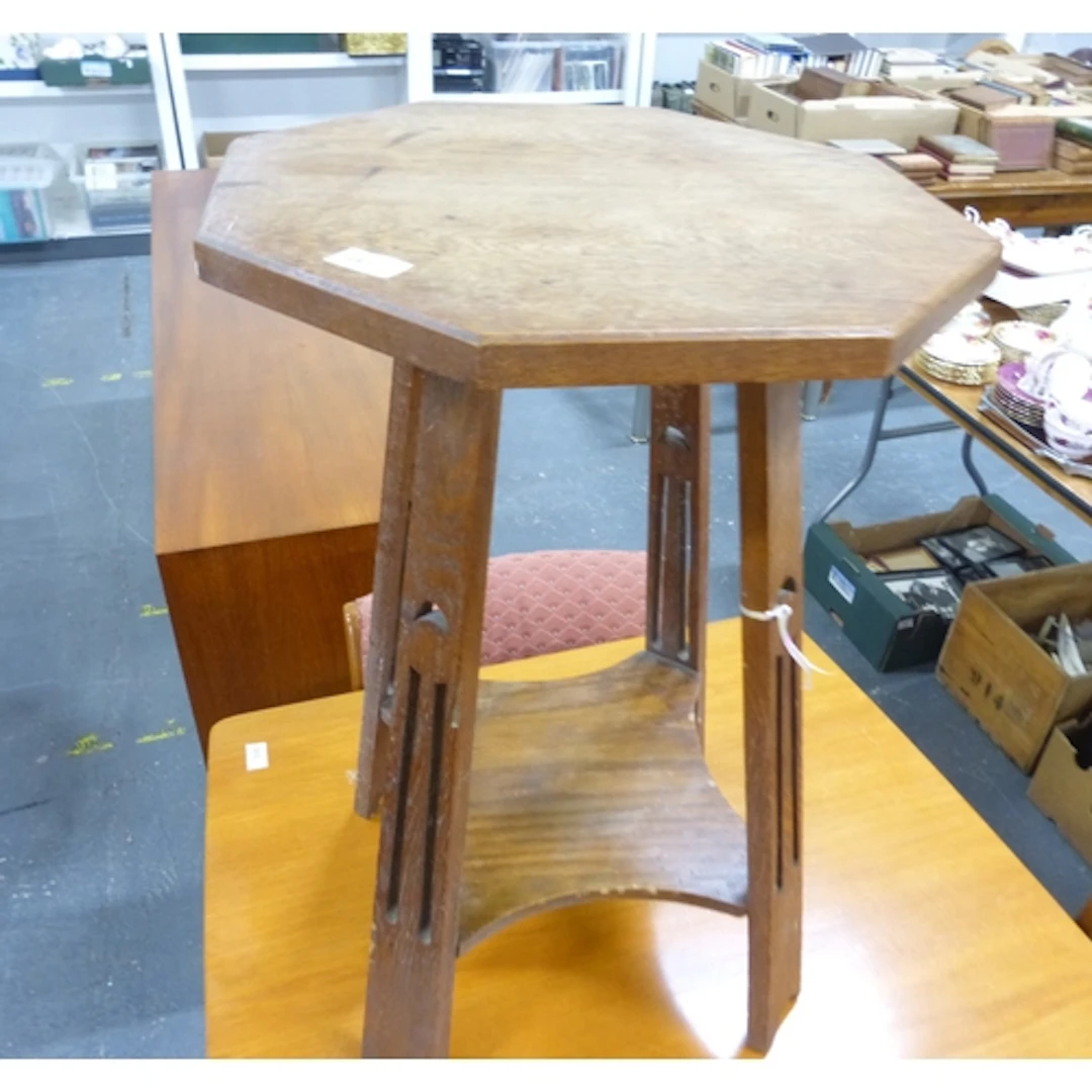 Oak Arts and Crafts two tier table. 45cm diameter.