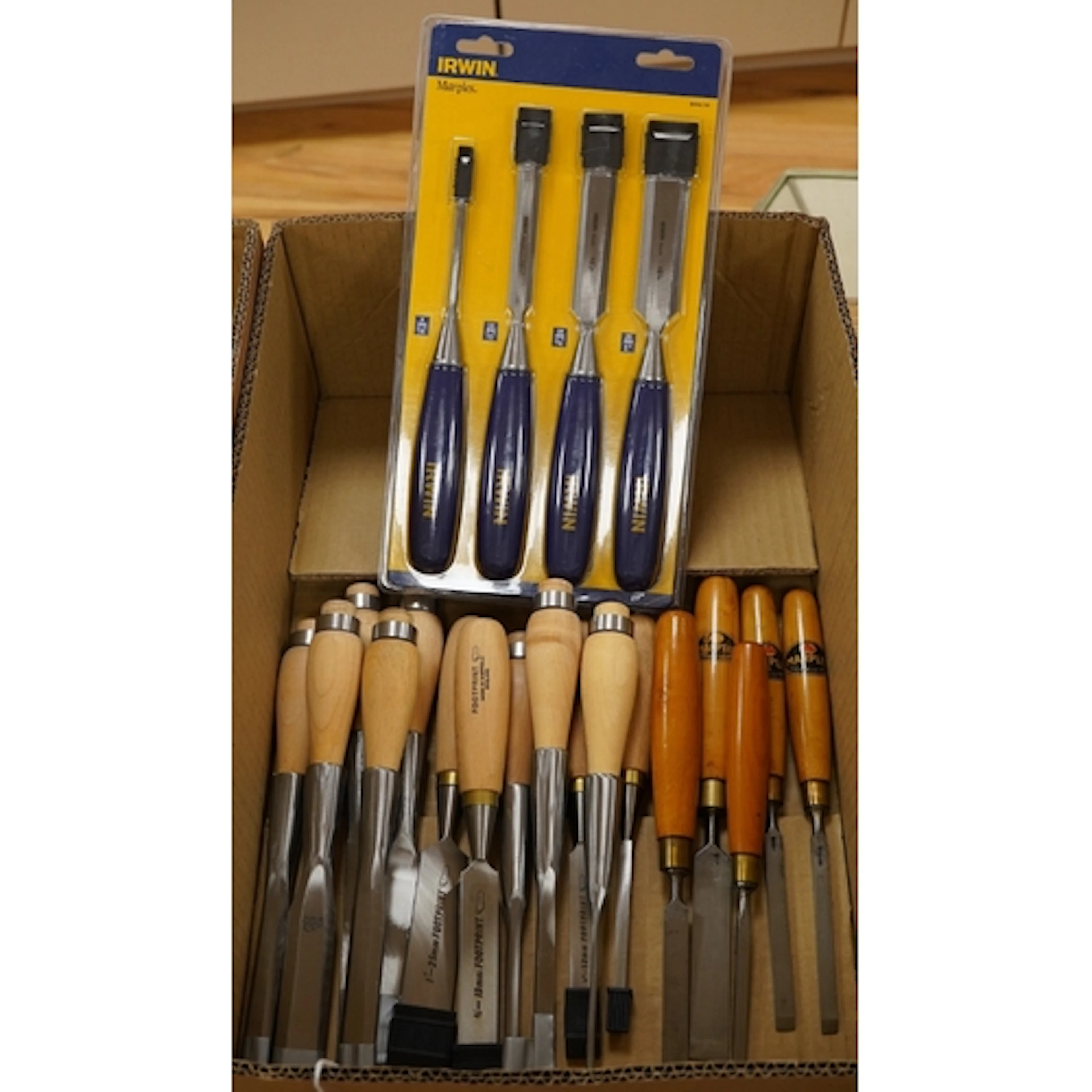 Twenty-one wood working chisels by Footprint, Marples, Irwin...