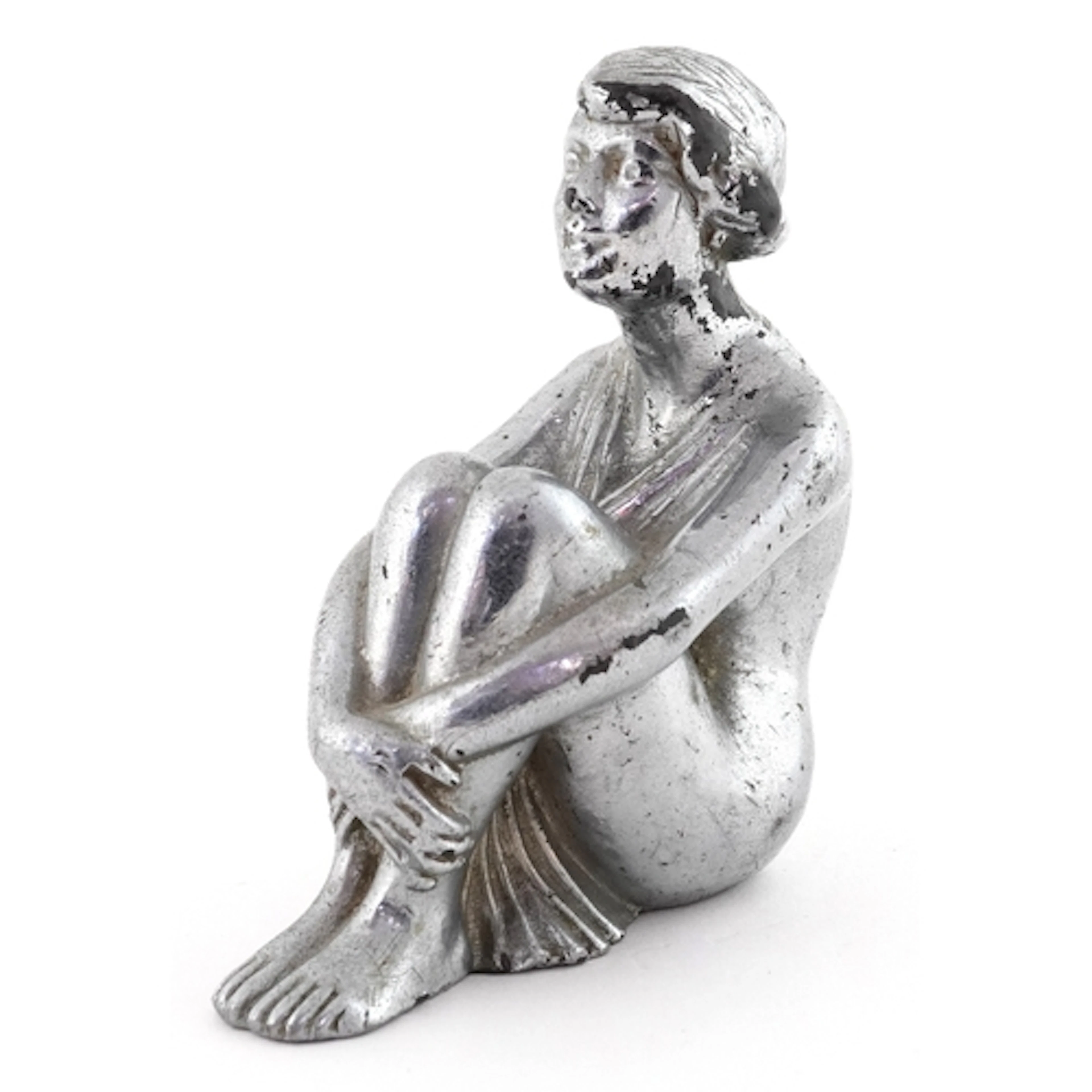 Art Deco chrome plated car mascot in the form of a seated fe...