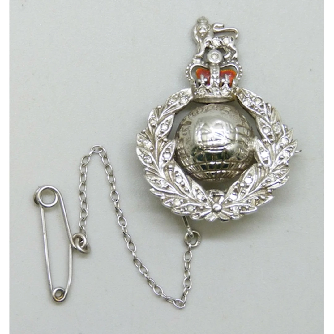 A 9ct white gold and enamel Royal Marines sweetheart brooch,...