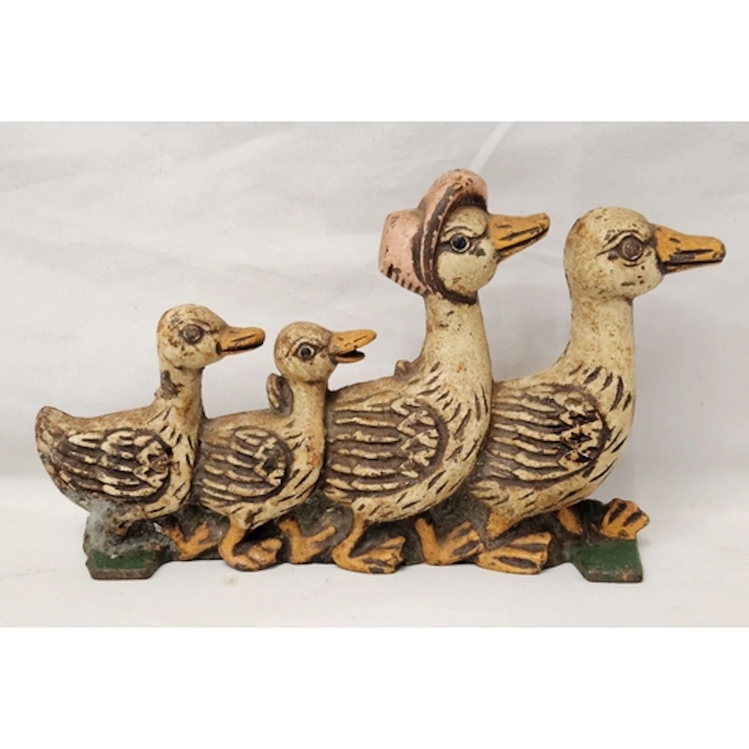 Vintage Cast Iron Doorstop with mother and father duck, duck...