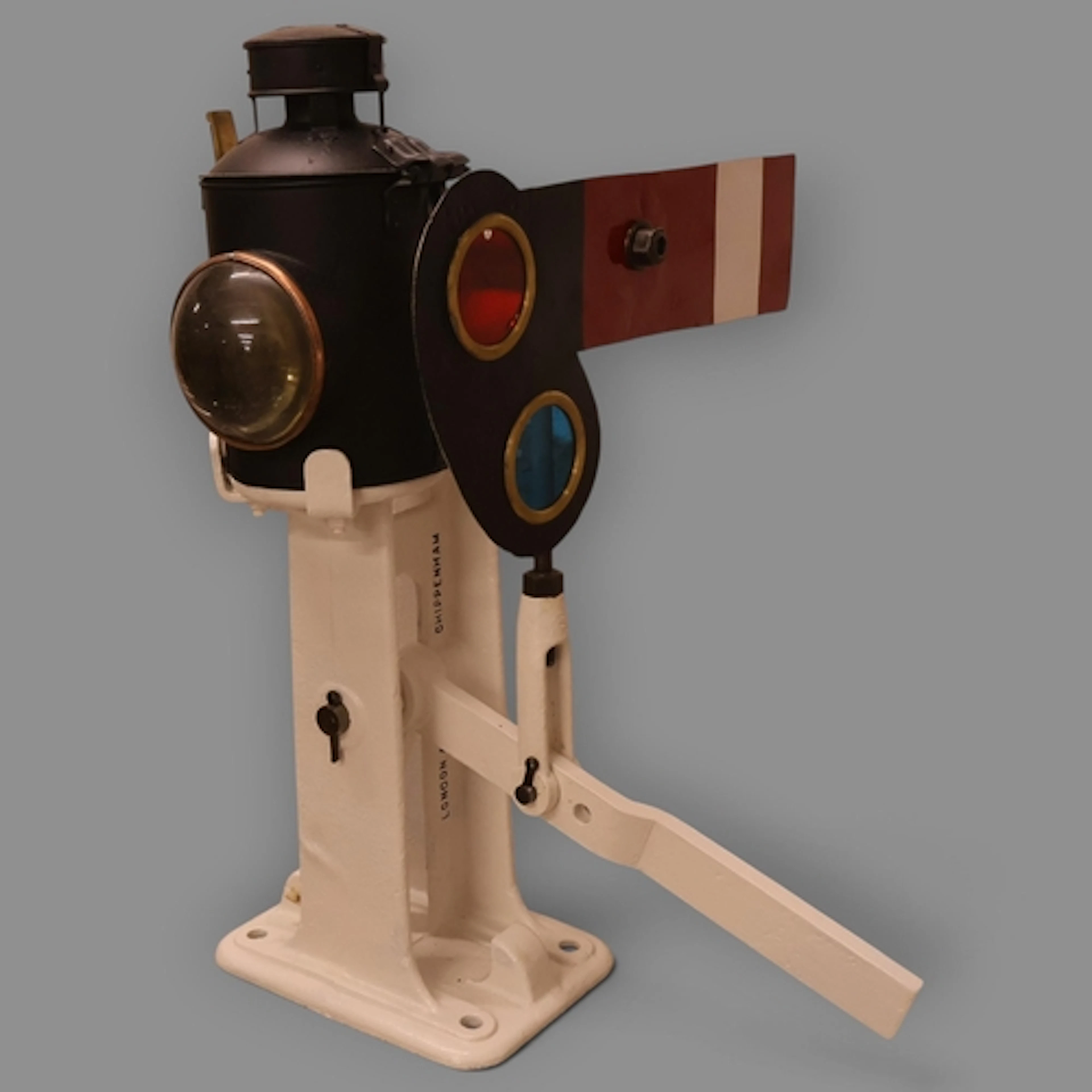 A painted cast iron railway shunting signal, complete with o...