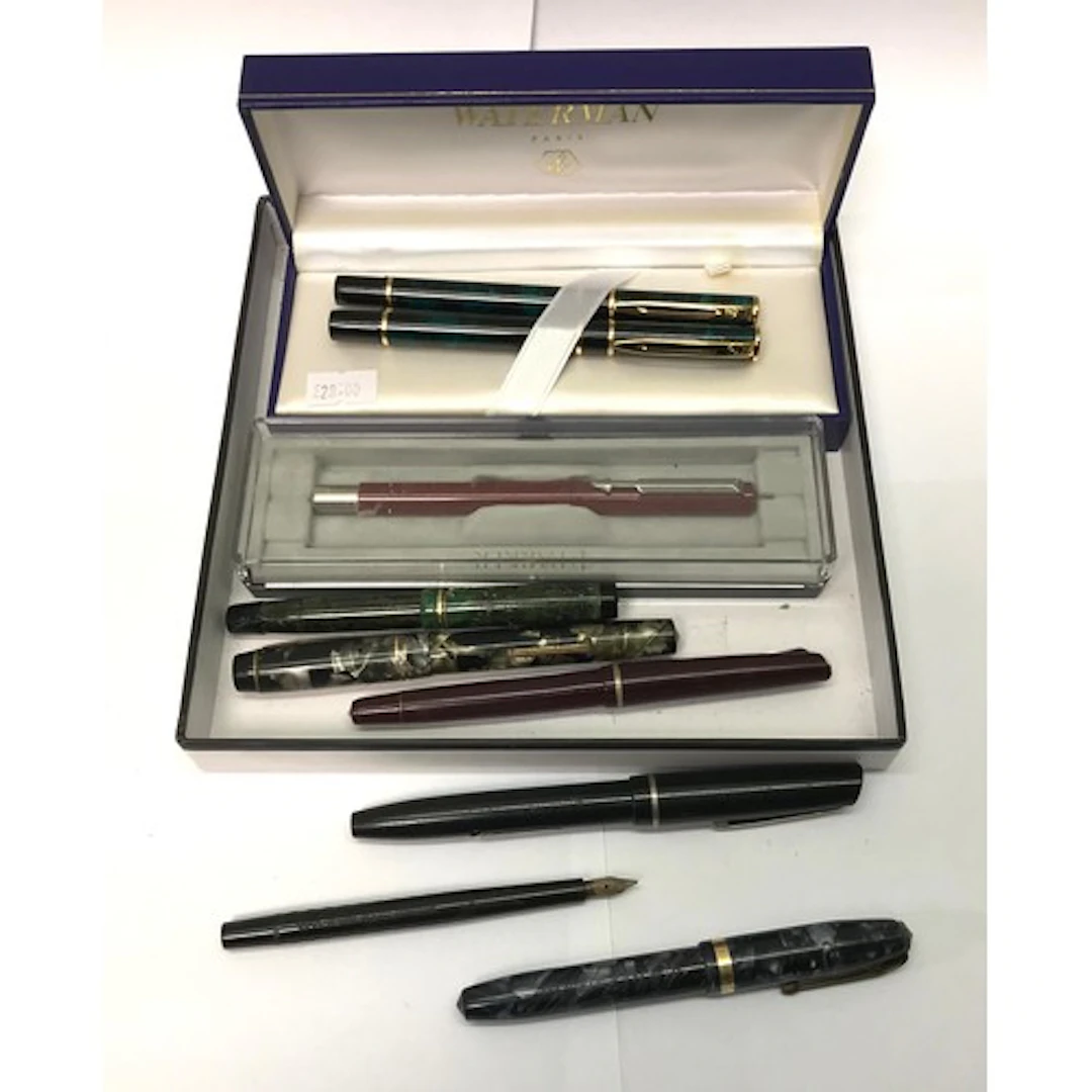 A qty of pens incl a Waterman fountain pen / rollerball set,...