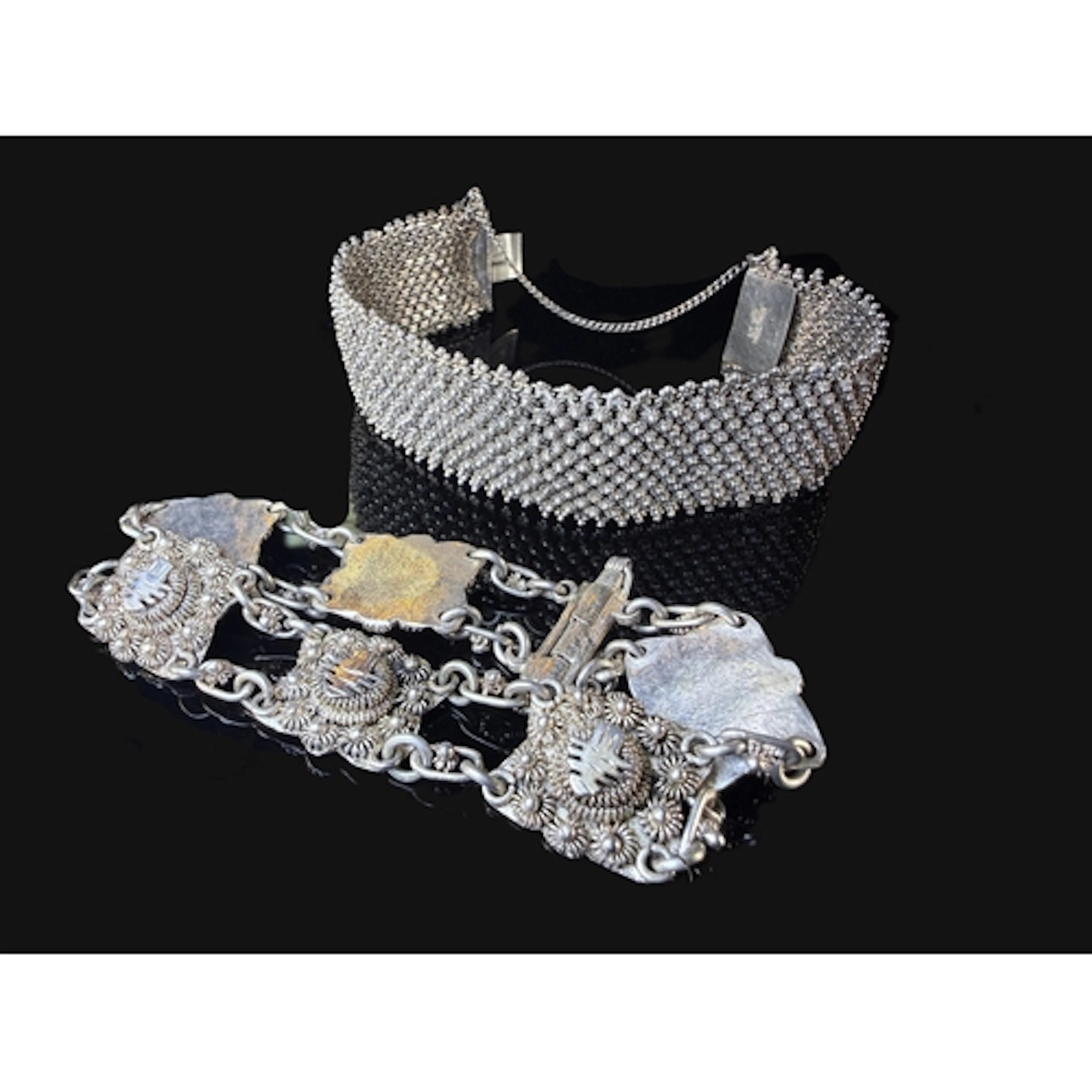 2 oriental style white metal bracelets both stamped SILVER, ...