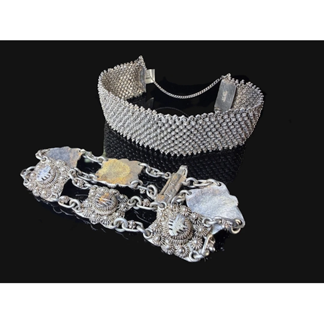 2 oriental style white metal bracelets both stamped SILVER, ...
