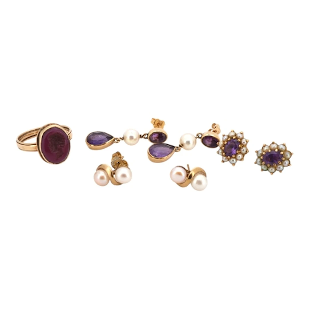 Three pairs of earrings and a red glass intaglio ring, compr...