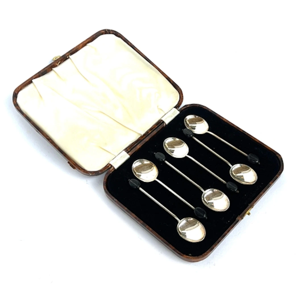 A cased set of six coffee bean terminal silver coffee spoons...