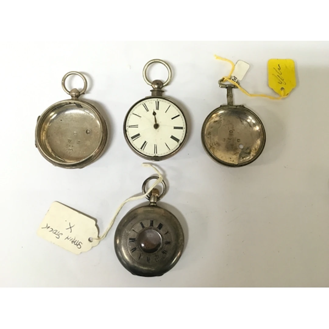 Three 19th century silver watch cases plus one back, all hal...