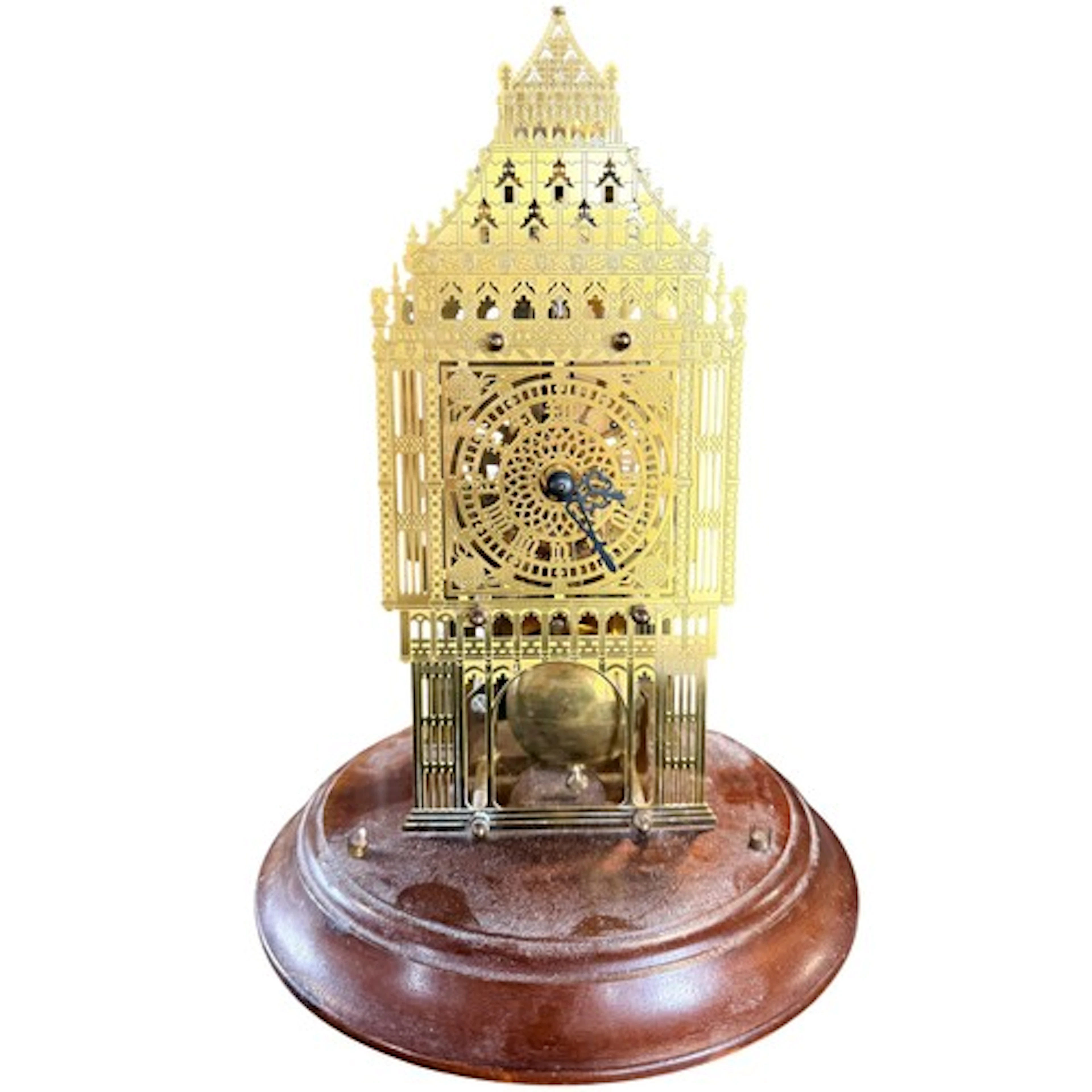 A Big Ben Anniversary cut brass skeleton clock under glass d...