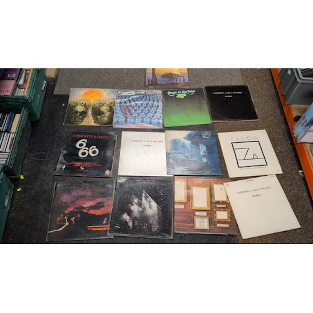 A collection of progressive rock LP records, including Aphro...