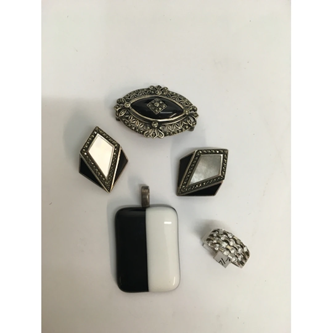 A 925 continental silver and marcasite brooch, a pair of sil...