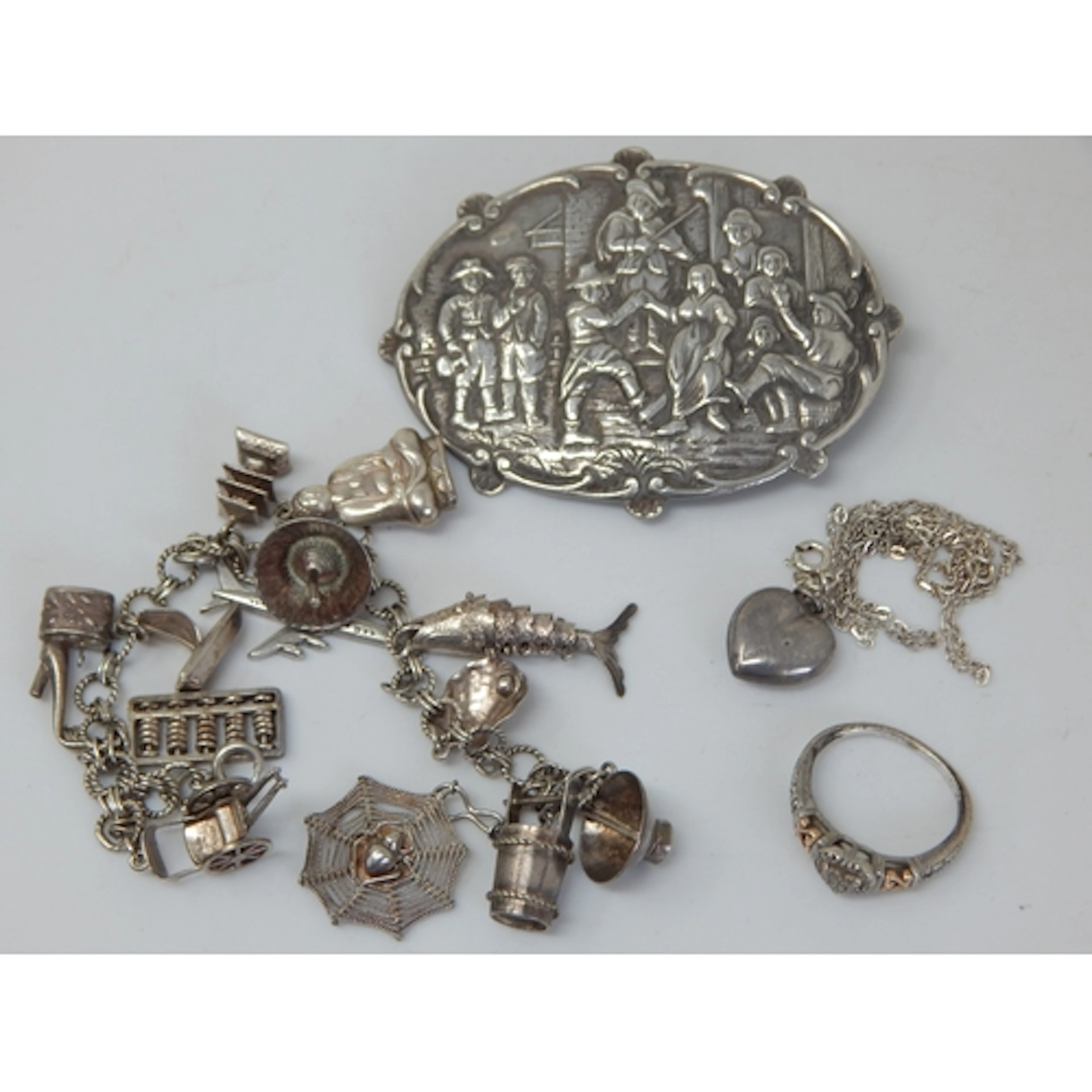 A Quantity of Silver Jewellery Including a Charm Bracelet, L...