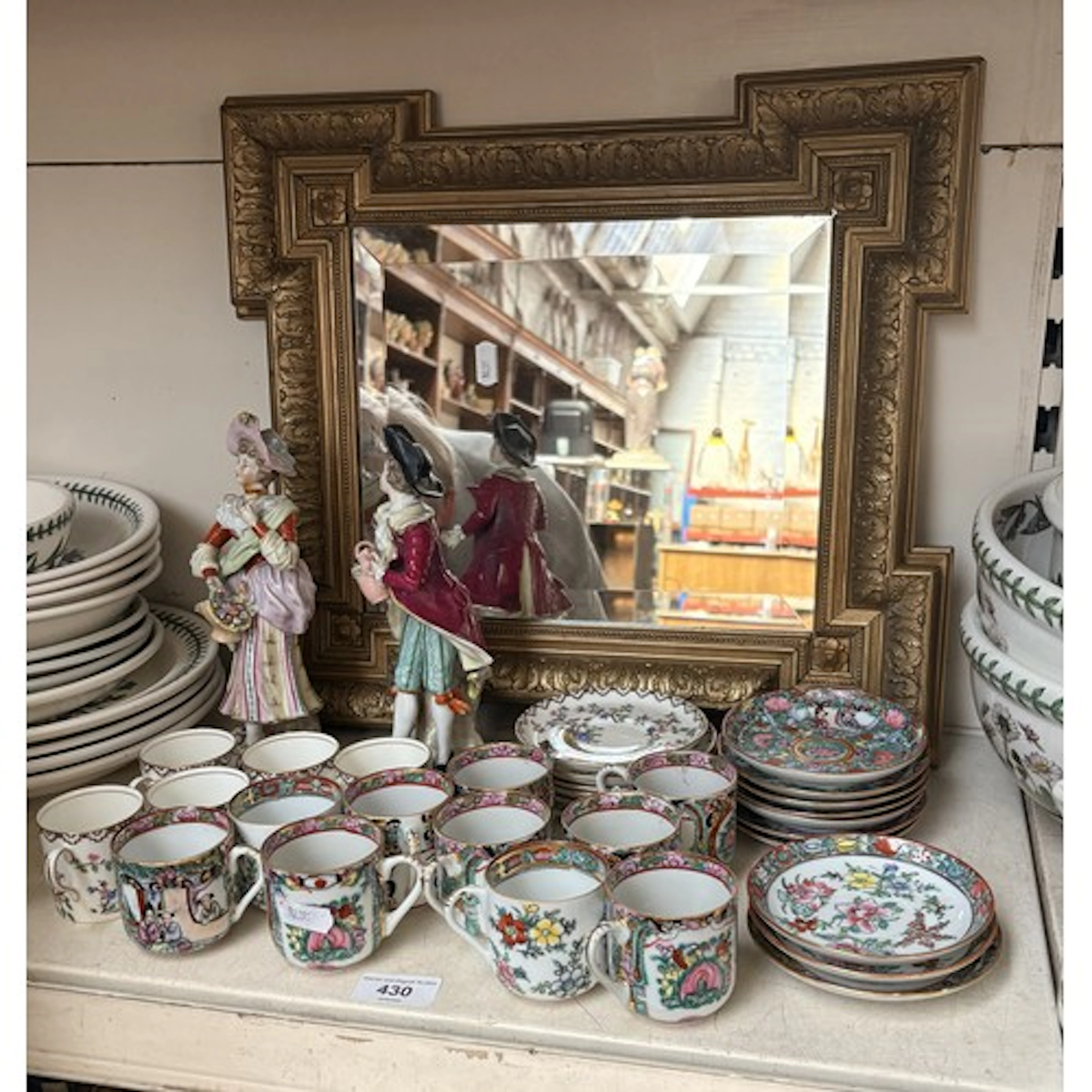 A gilt framed mirror, 2 Meissen figures, 16 oriental saucers...