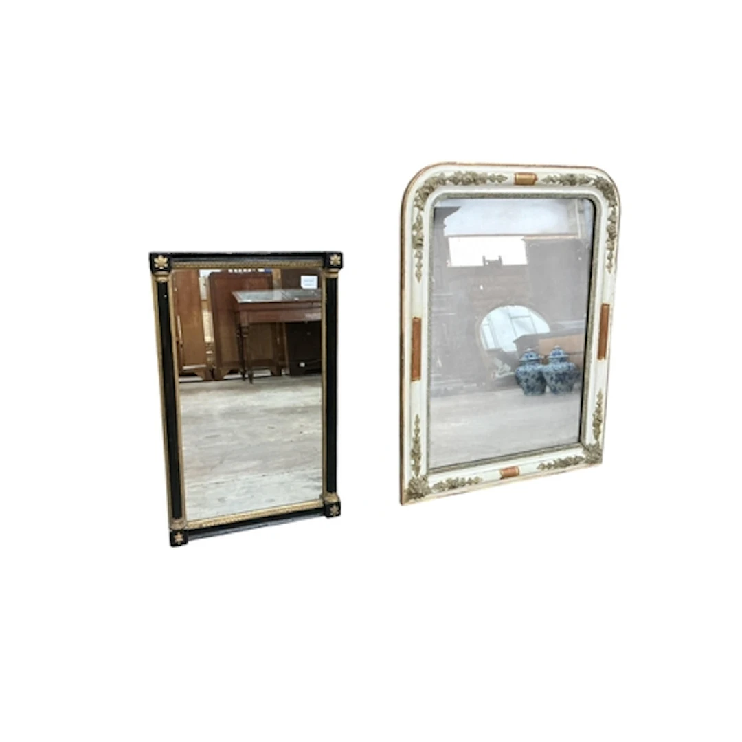 A French cream painted mirror and black fluted column mirror...