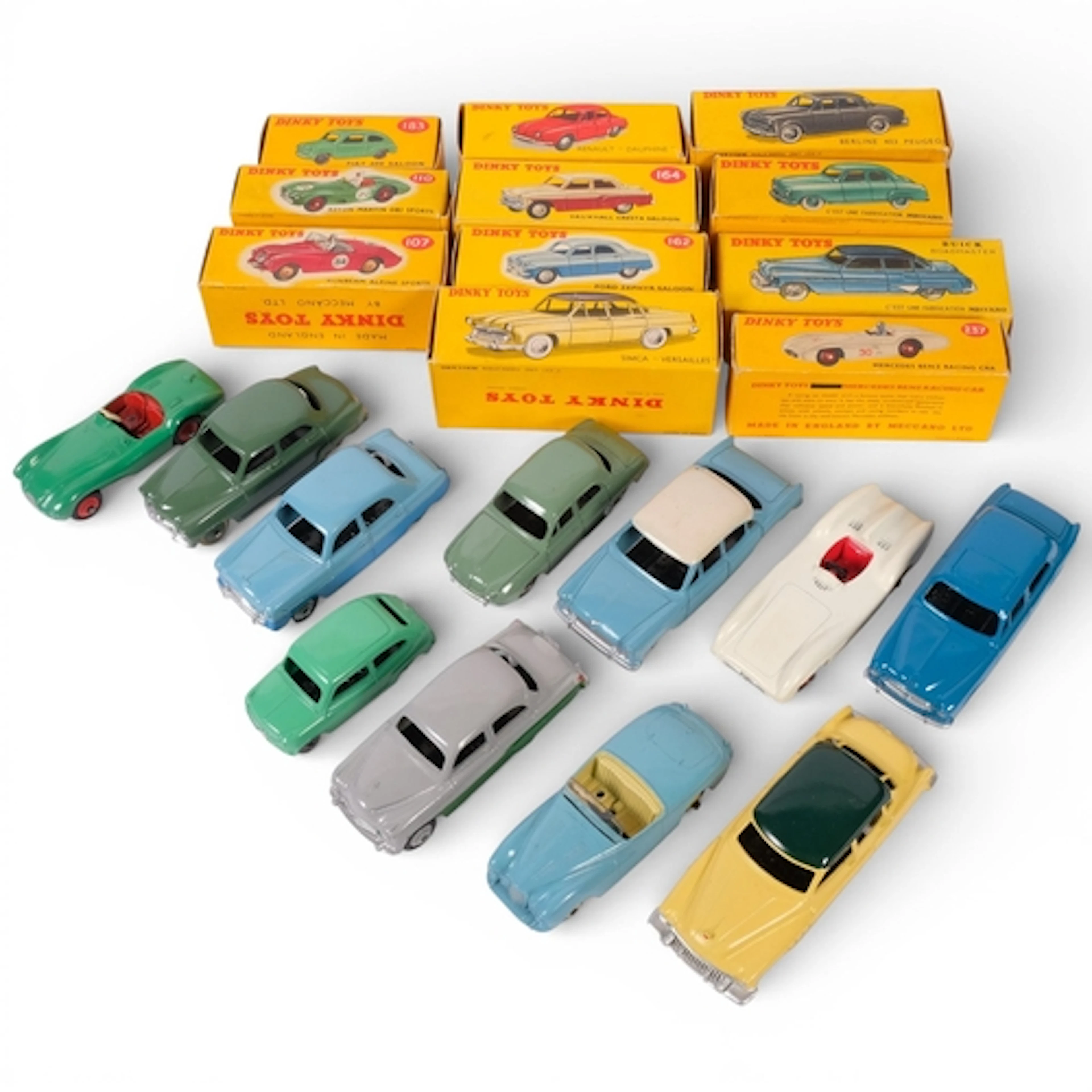 A collection of 11 Vintage boxed Dinky Toy cars, including a...