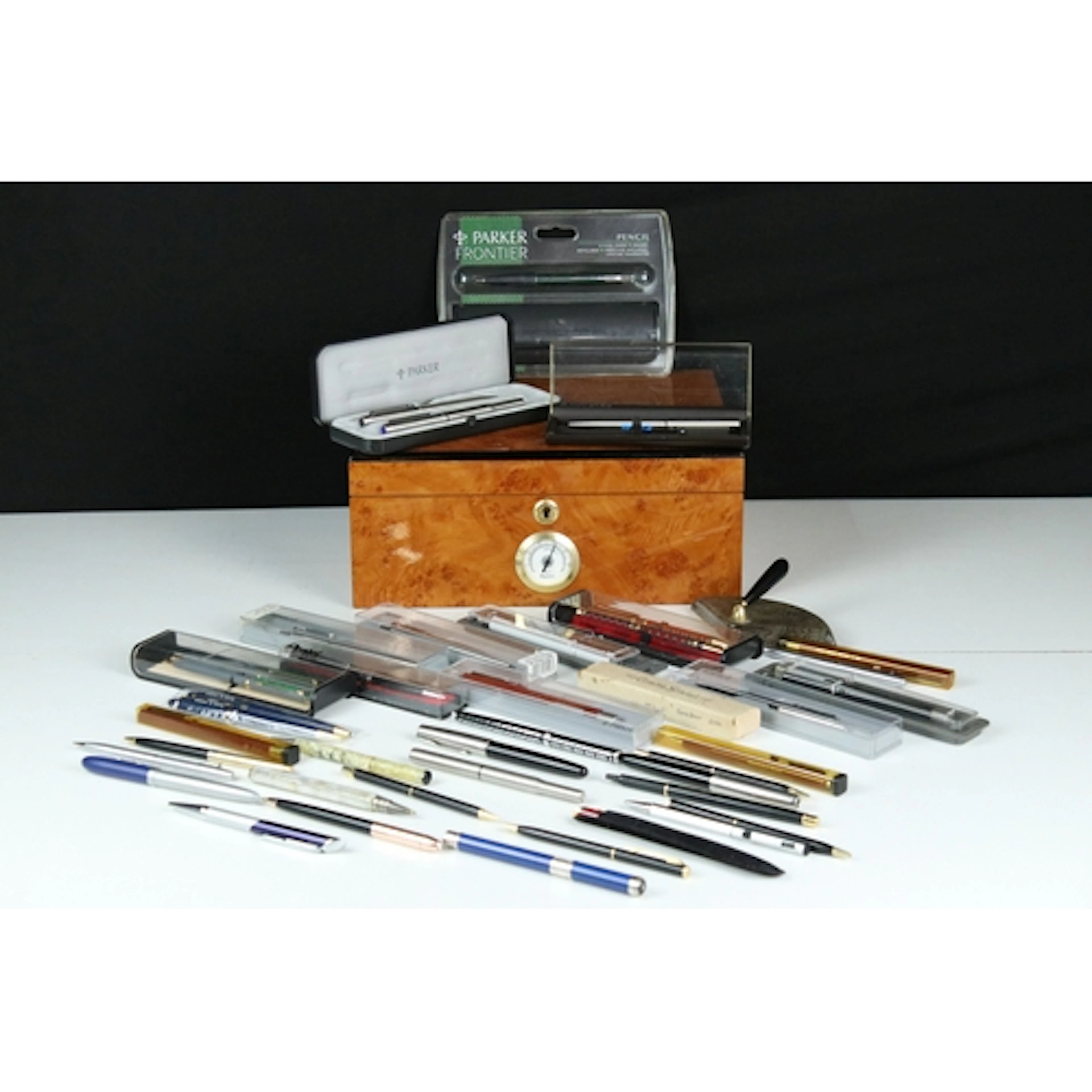 Collection of pens and mechanical pencils to include a boxed...