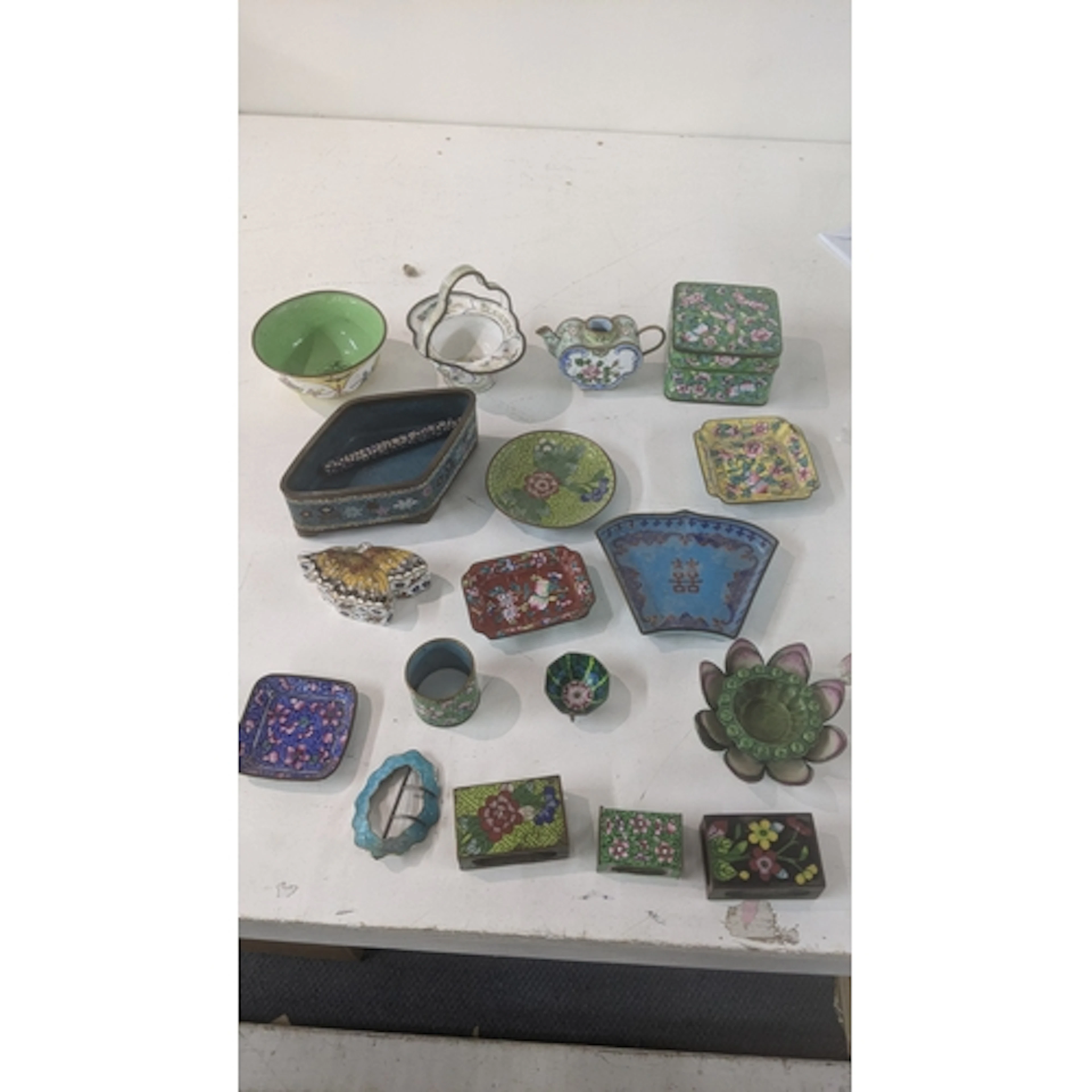 Oriental cloisonne items to include matchbox covers, a napki...