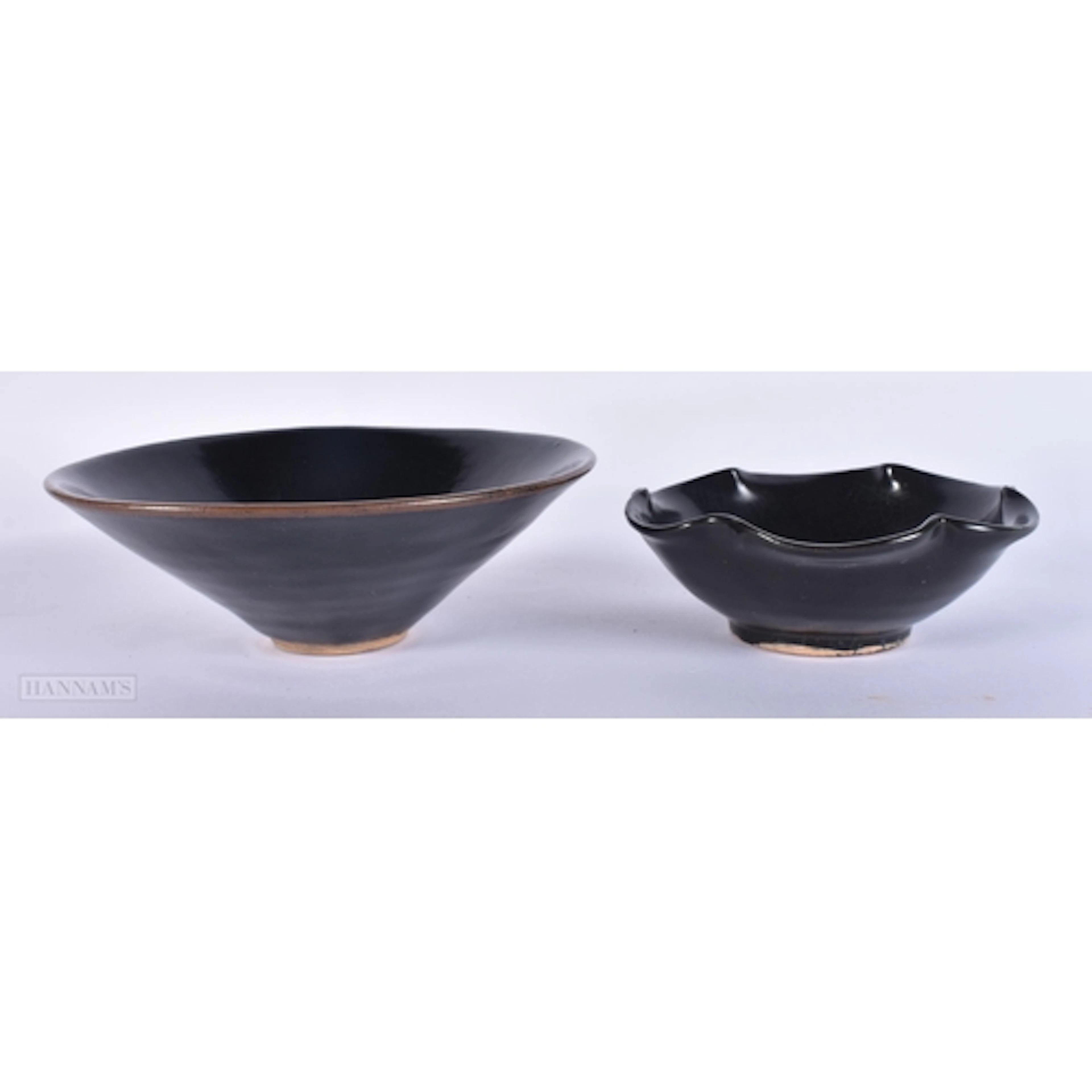 A CHINESE JIZHOU KILN BLACK GLAZED FLORAL LEAF MOULDED BOWL ...