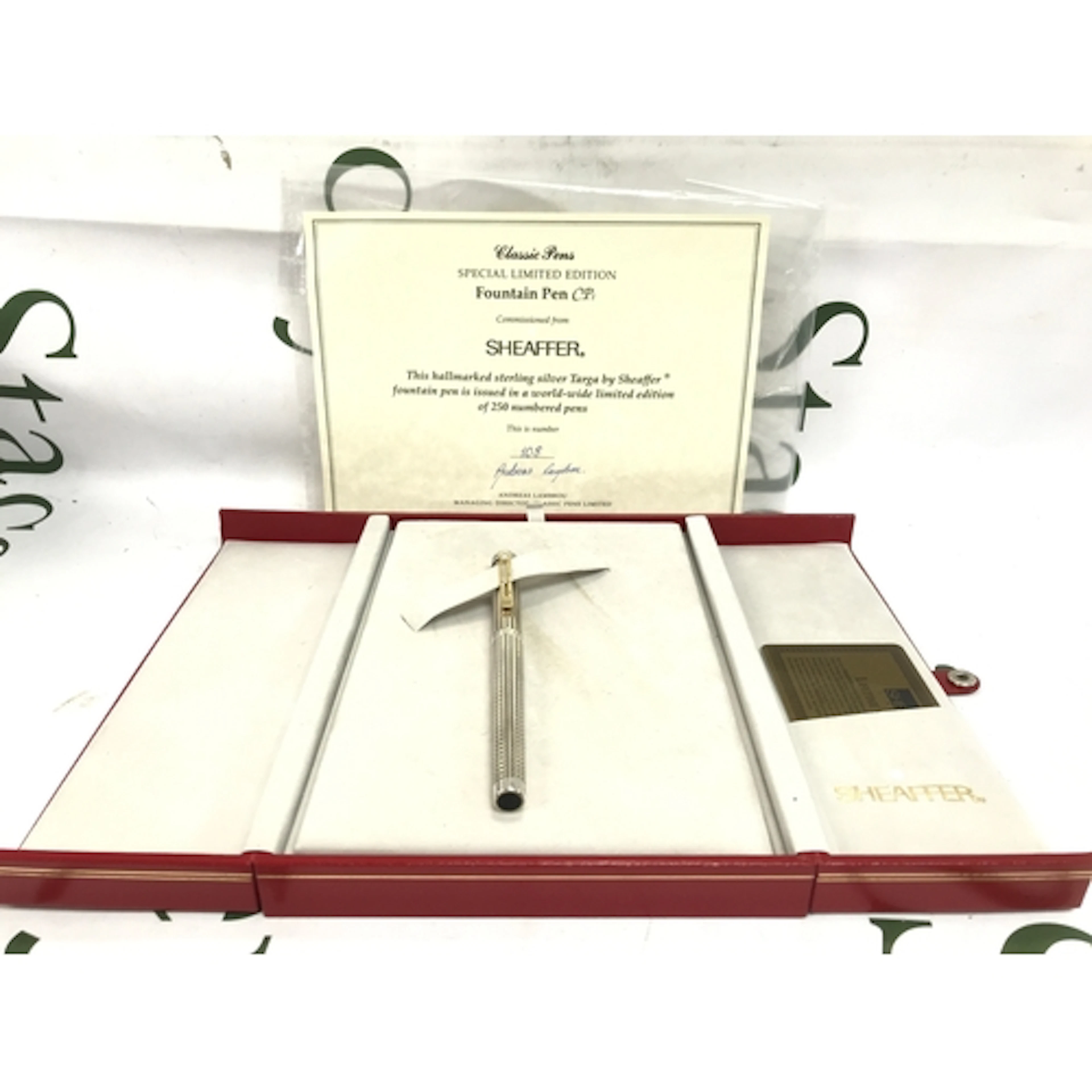 A boxed Sheaffer silver limited edition pen 108/250