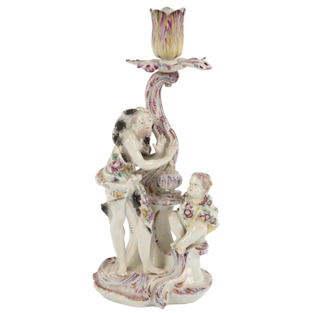 An early Derby porcelain figural candlestick emblematic of W...