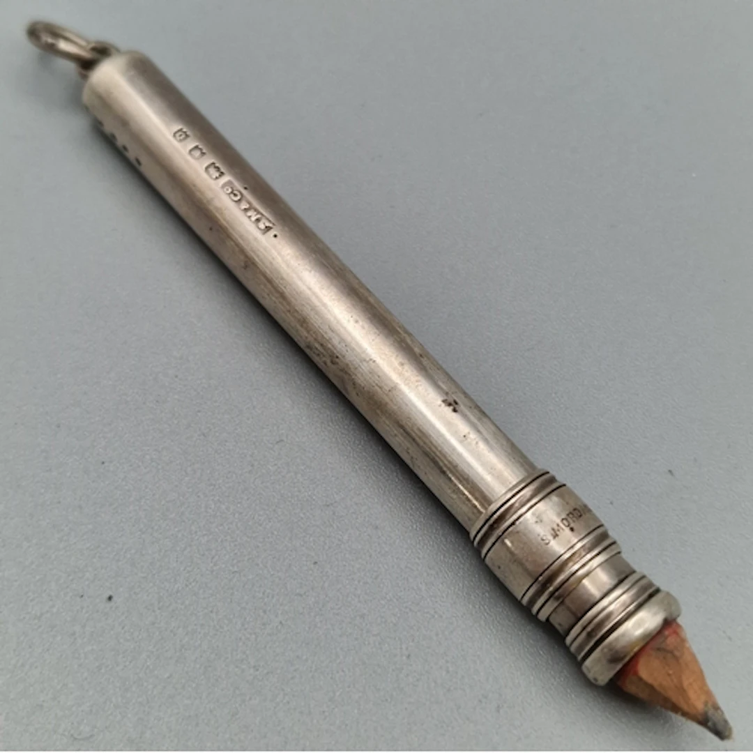 Sampson Mordan Co, a silver propelling pencil of plain cylin...