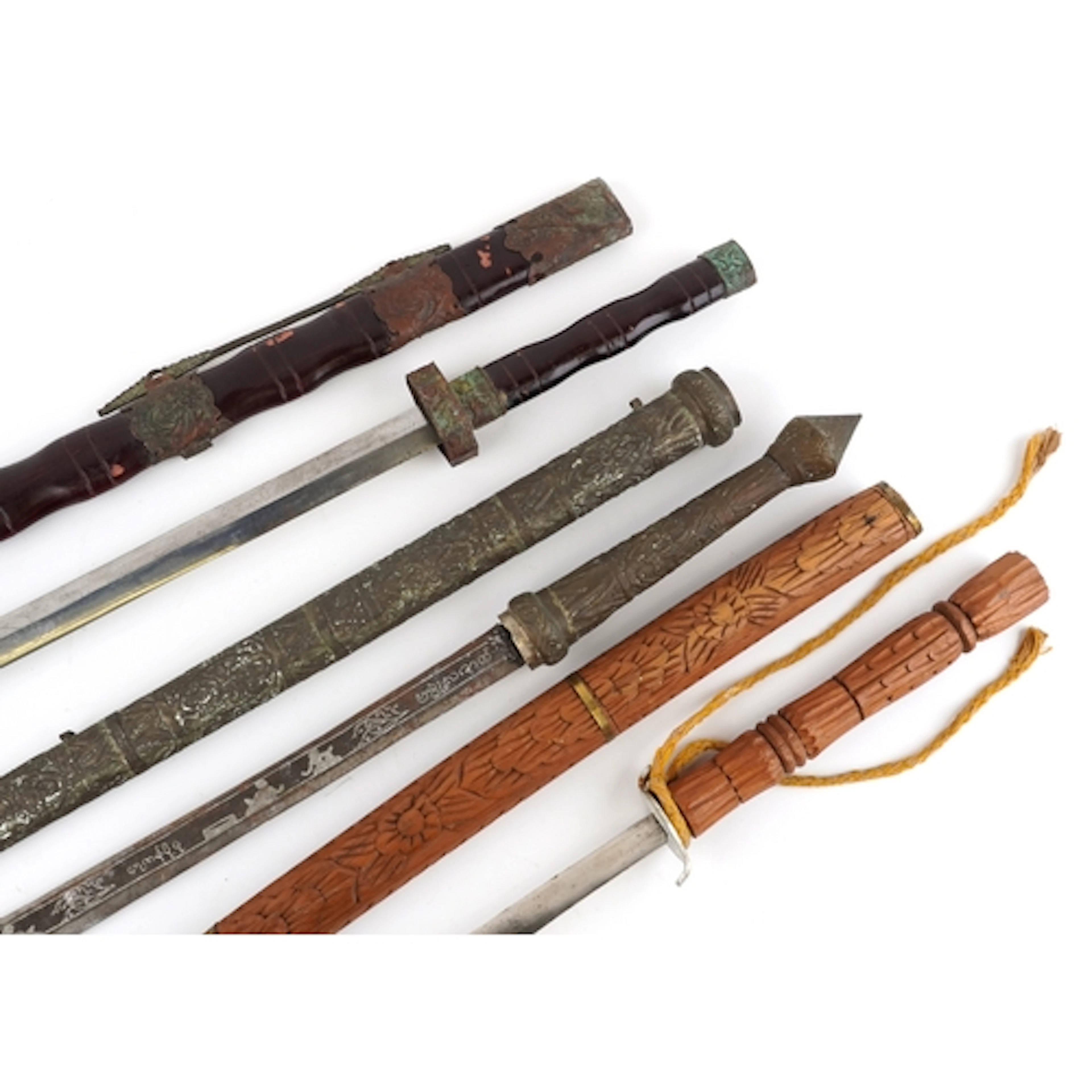 Three antique and later Asian and Eastern swords with scabba...
