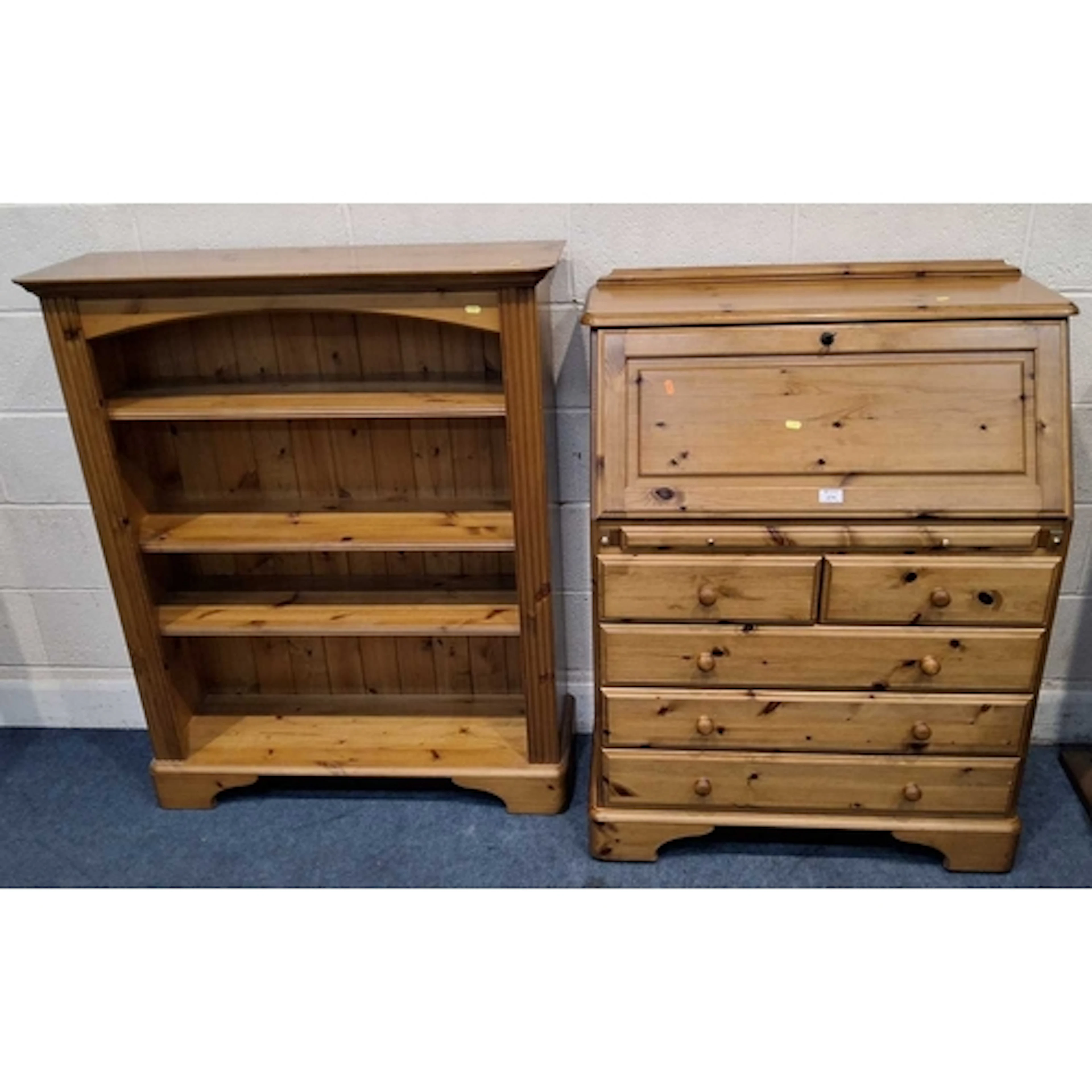 A DUCAL PINE BUREAU, the fall front door enclosing a fitted ...
