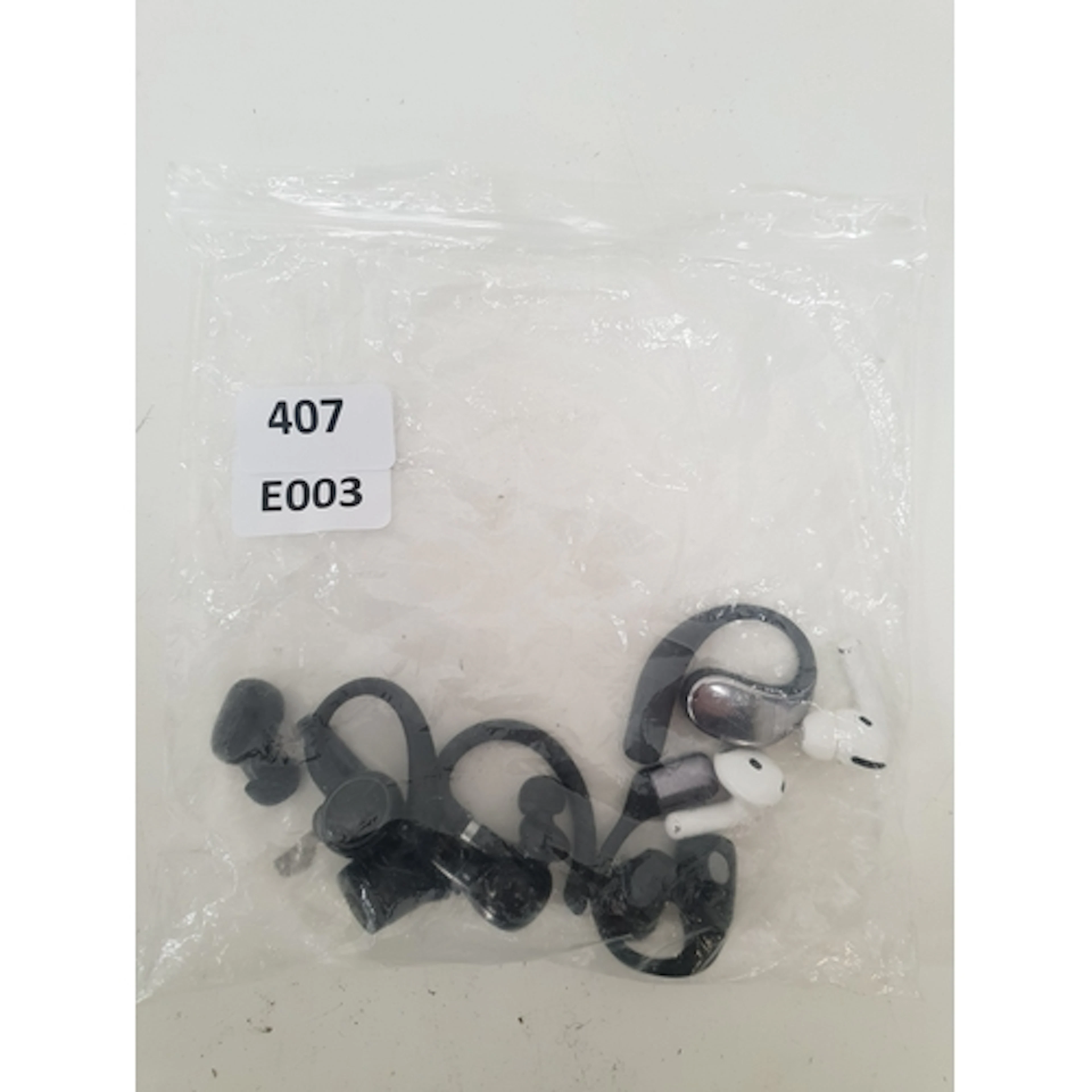 ONE BAG OF NINE SINGLE EARBUDS including Apple