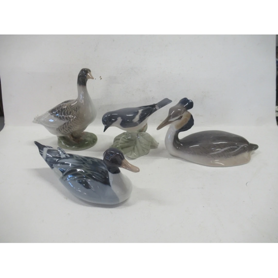 Four Royal Copenhagen models, of birds