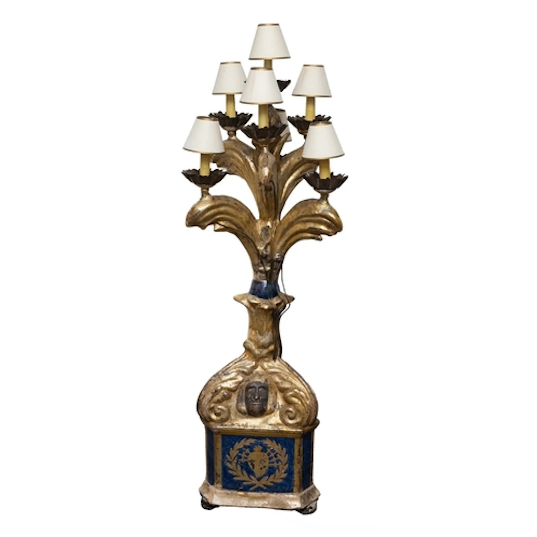 A carved and parcel silvered, parcel gilt and painted wood s...