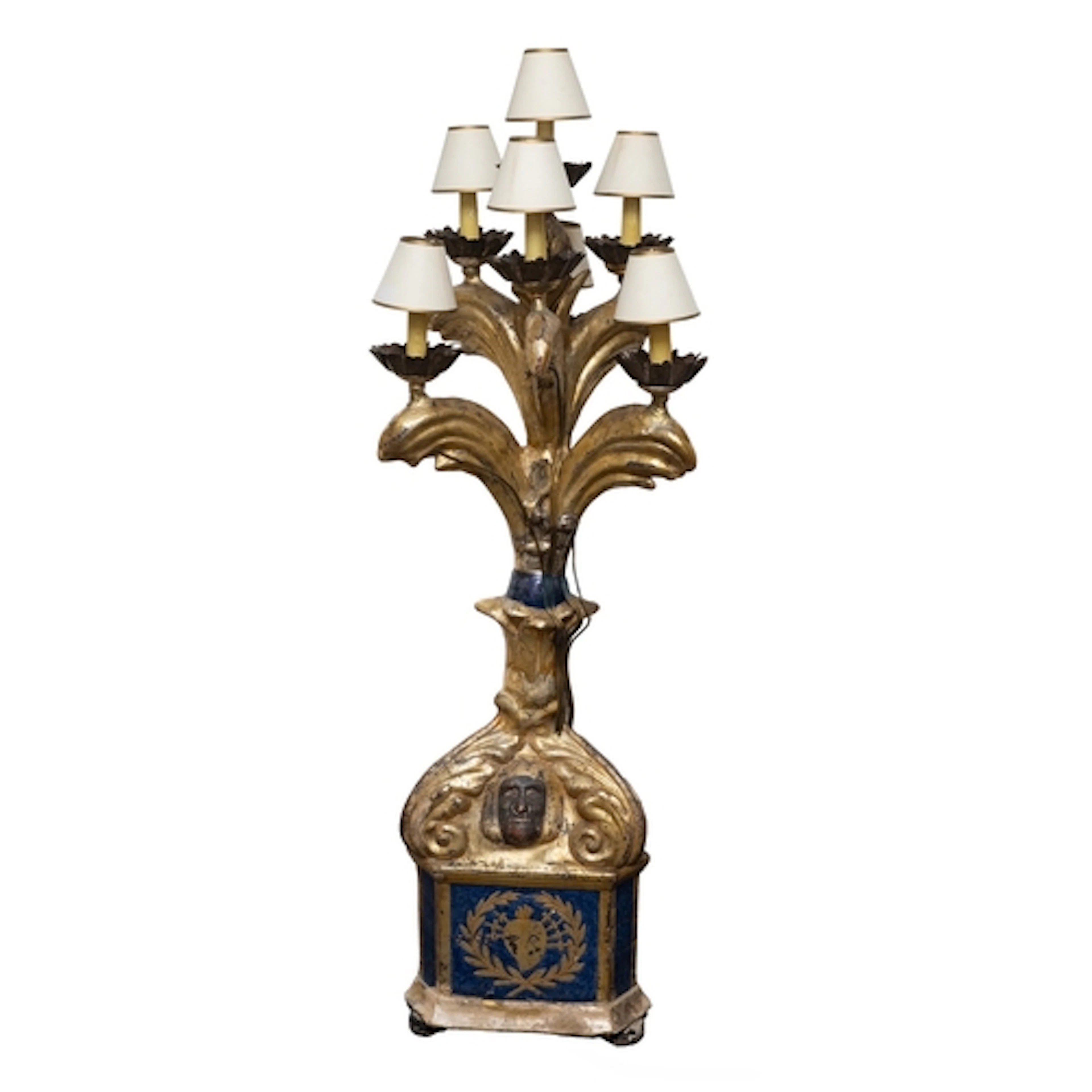 A carved and parcel silvered, parcel gilt and painted wood s...