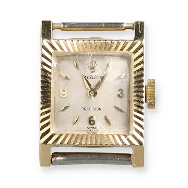 AN 18CT GOLD ROLEX PRECISION WATCH With square champagne col...