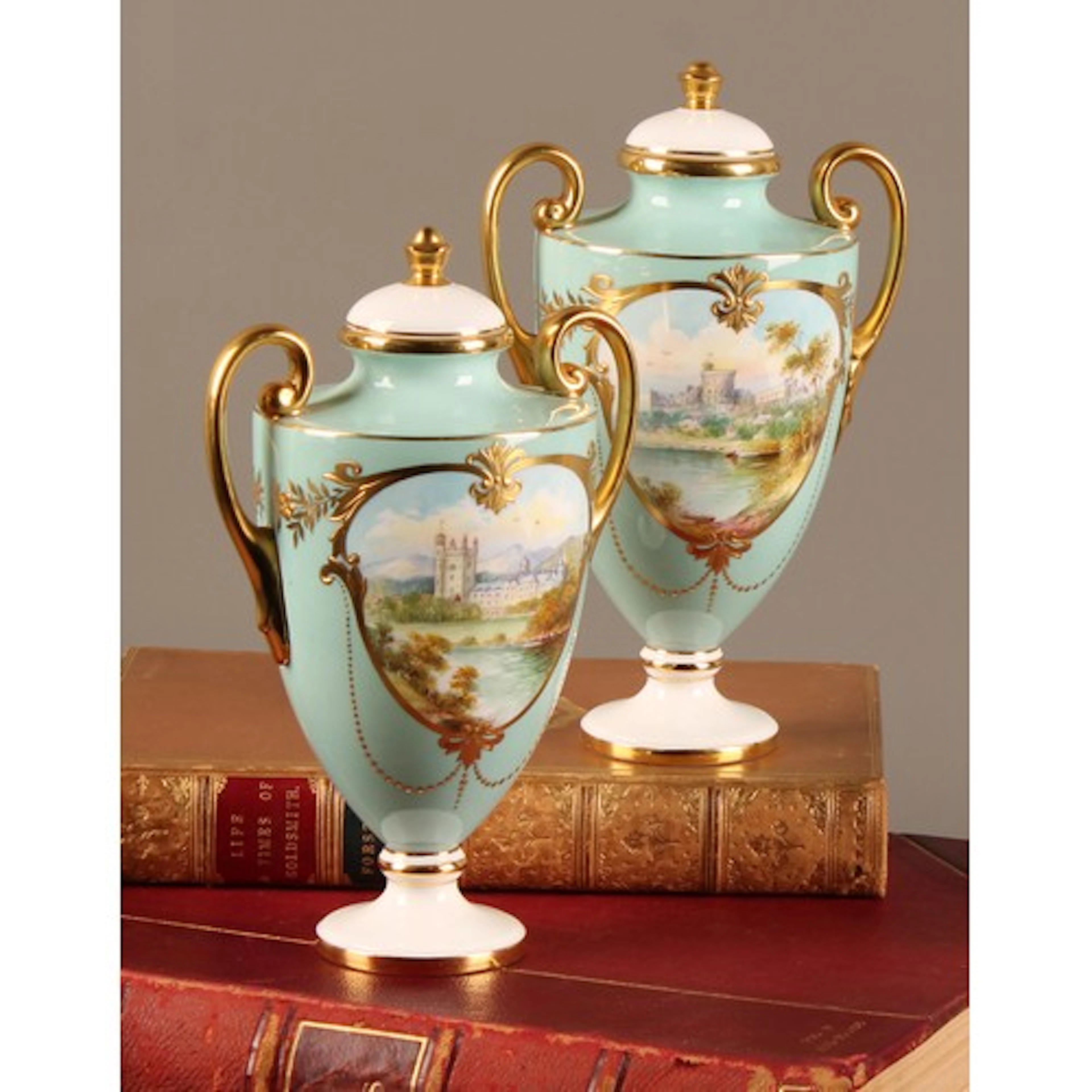 A pair of Minton two-handled pedestal vases and covers, pain...