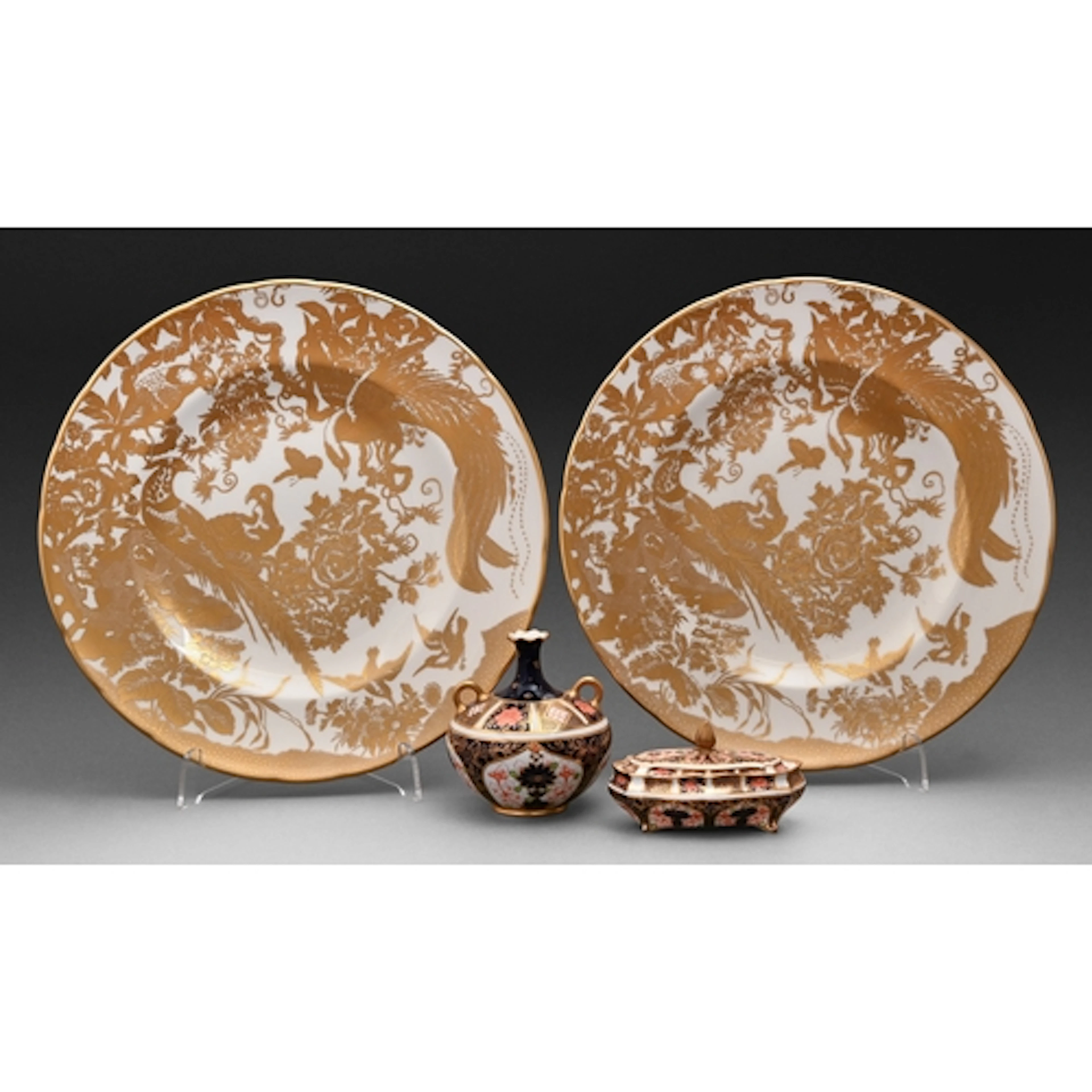A Royal Crown Derby two-handled Imari pattern vase and trink...