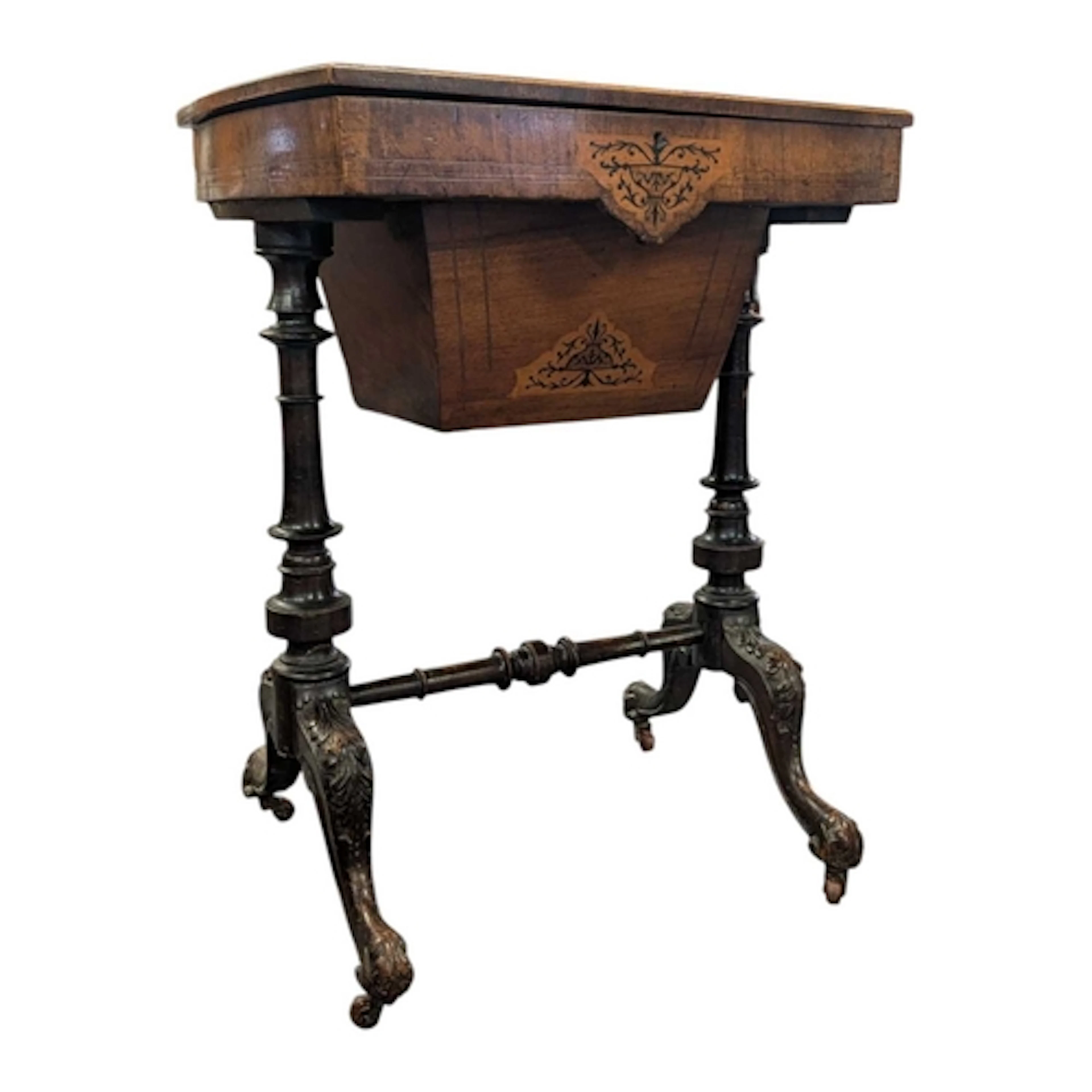 A 19th century Victorian walnut sewing table. The marquetry ...