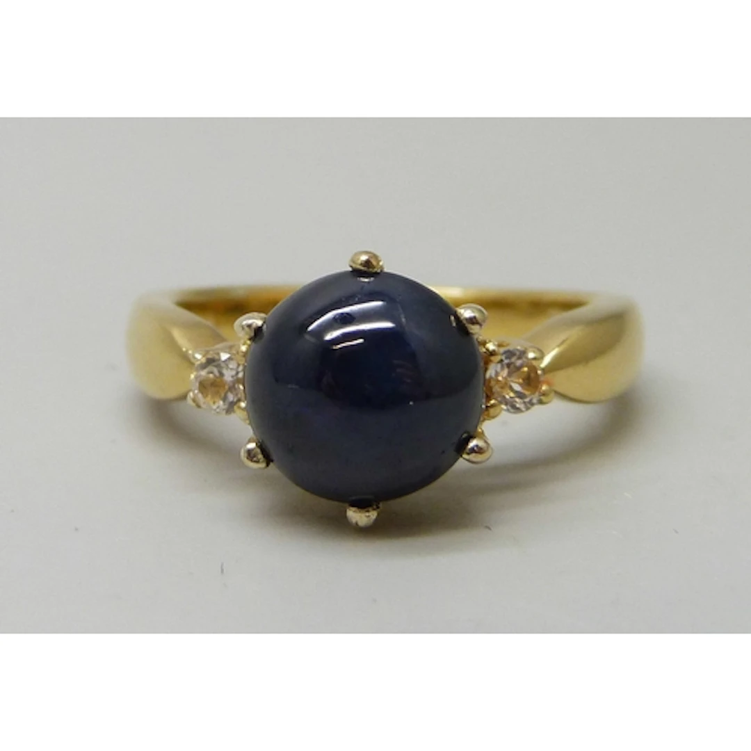 A TGGC silver gilt, star sapphire and possibly white topaz r...