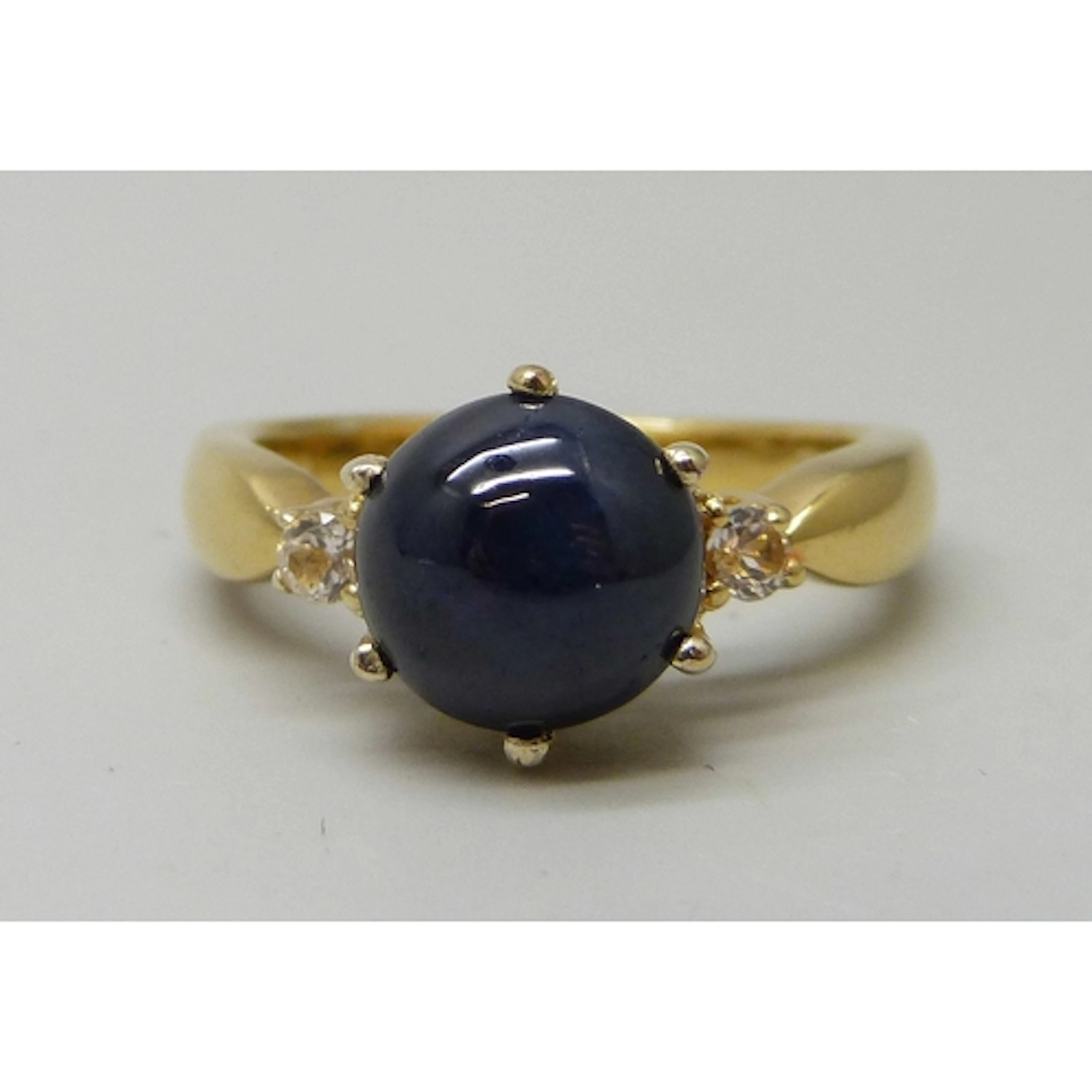 A TGGC silver gilt, star sapphire and possibly white topaz r...