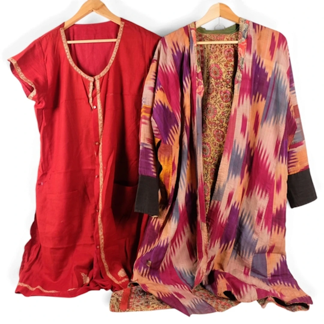 An Uzbek ikat chapan traditional silk and cotton robe, and a...