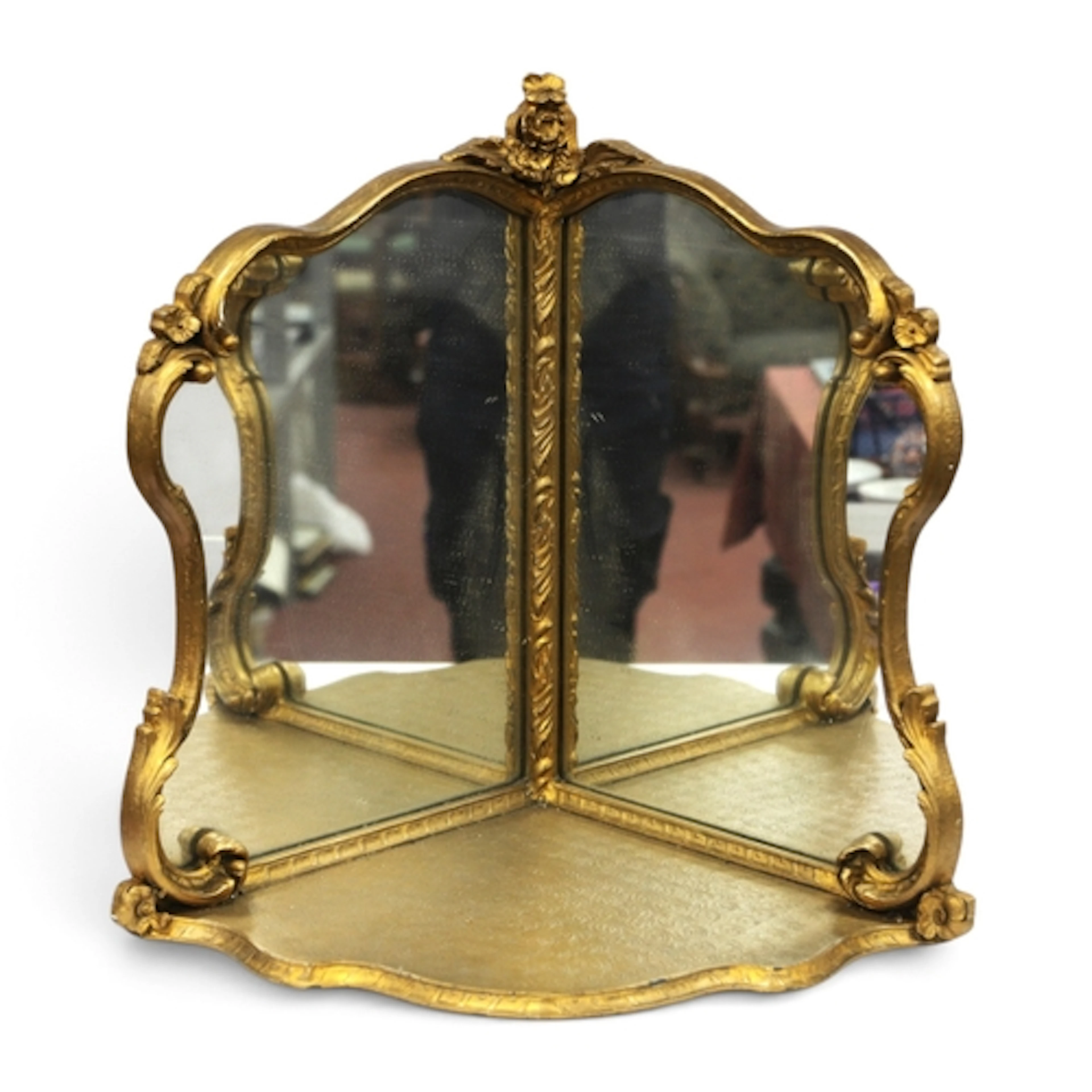 A Rococo Style Gilt Finished Corner Shelf, with mirrored bac...