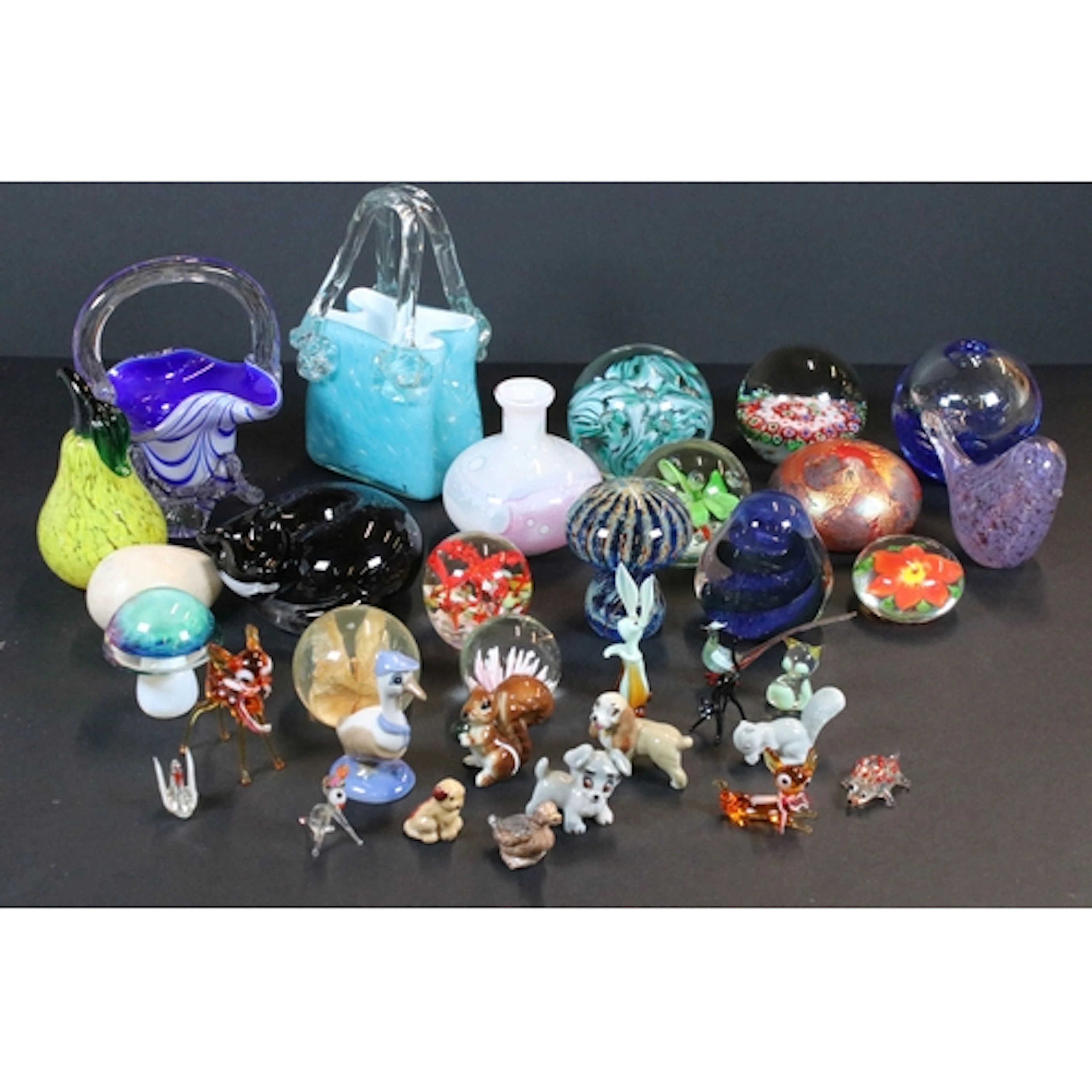 Collection of glass paperweights, to comprise Isle of Wight,...