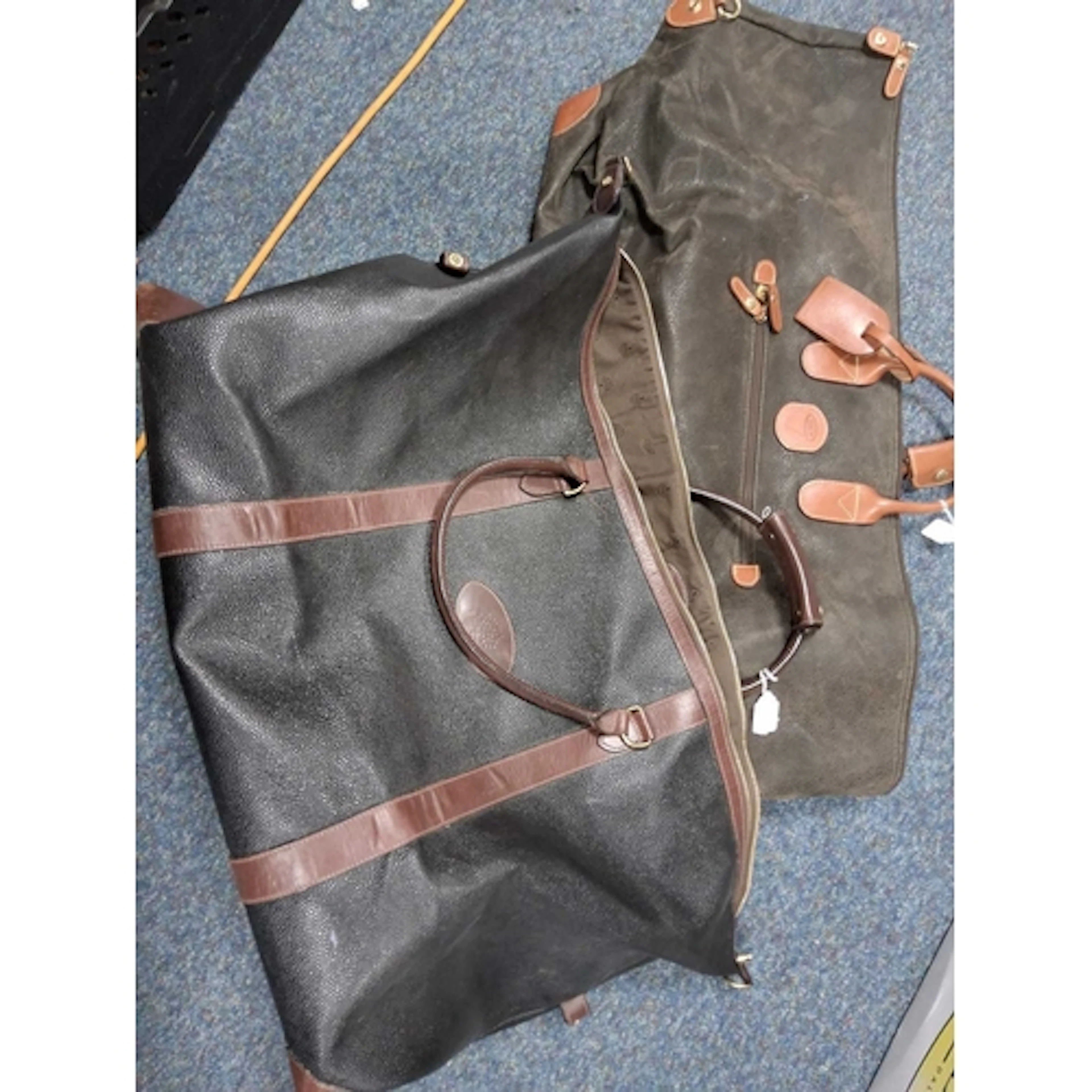 A LARGE VINTAGE MULBERRY CLIPPER HOLDALL AND A BRICS HOLDALL...