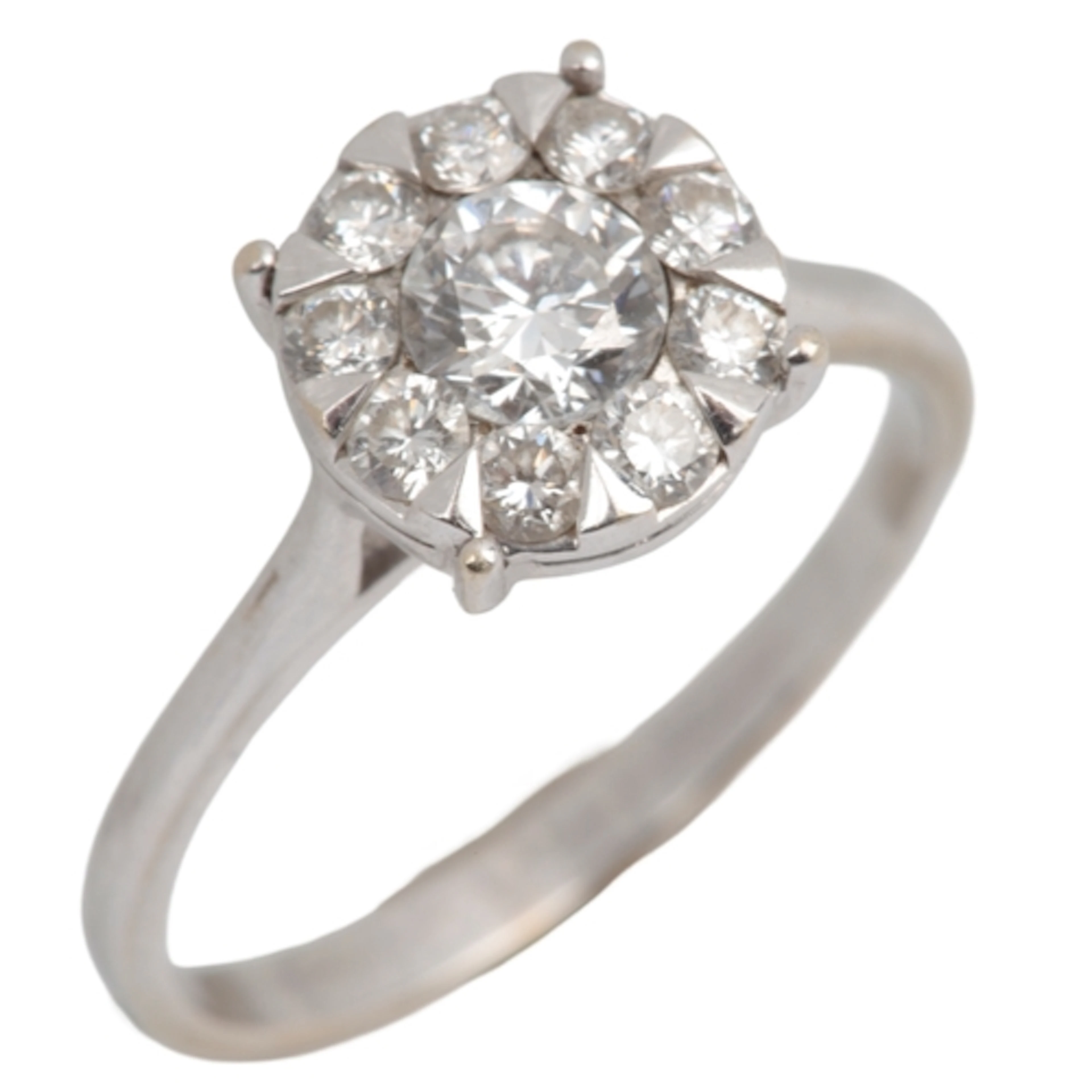 A diamond cluster ring, centring on a brilliant-cut diamond ...
