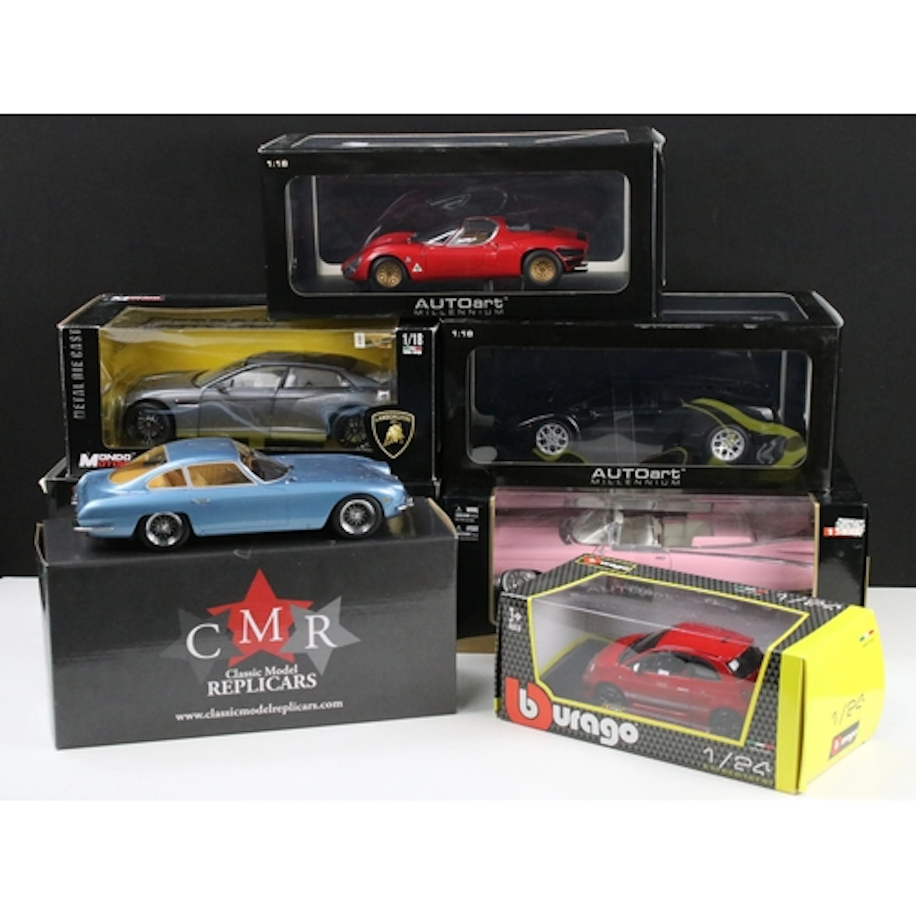 Seven boxed 1/18-1/24 scale diecast models to include AutoAr...