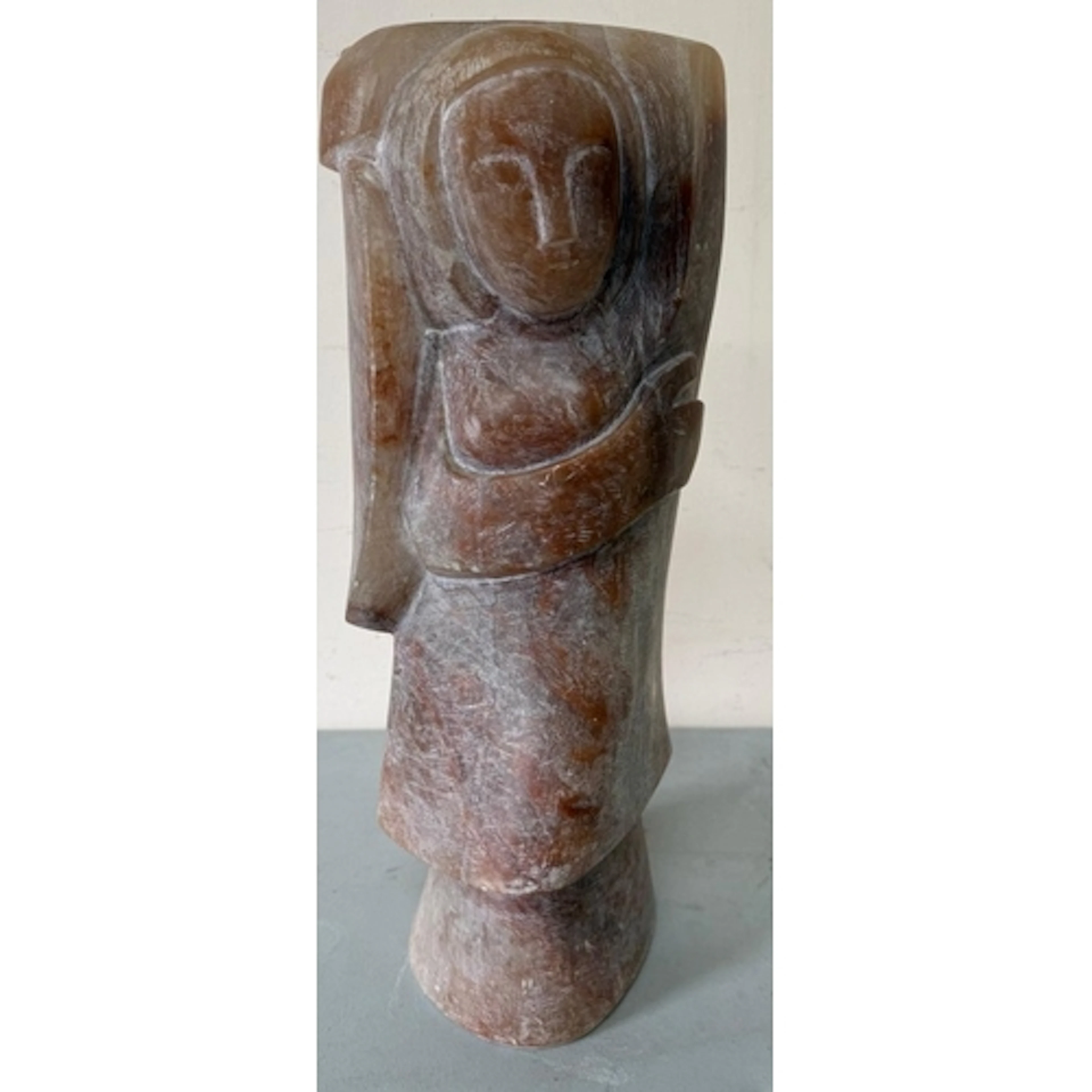 A stone sculpture resembling a stylised figure