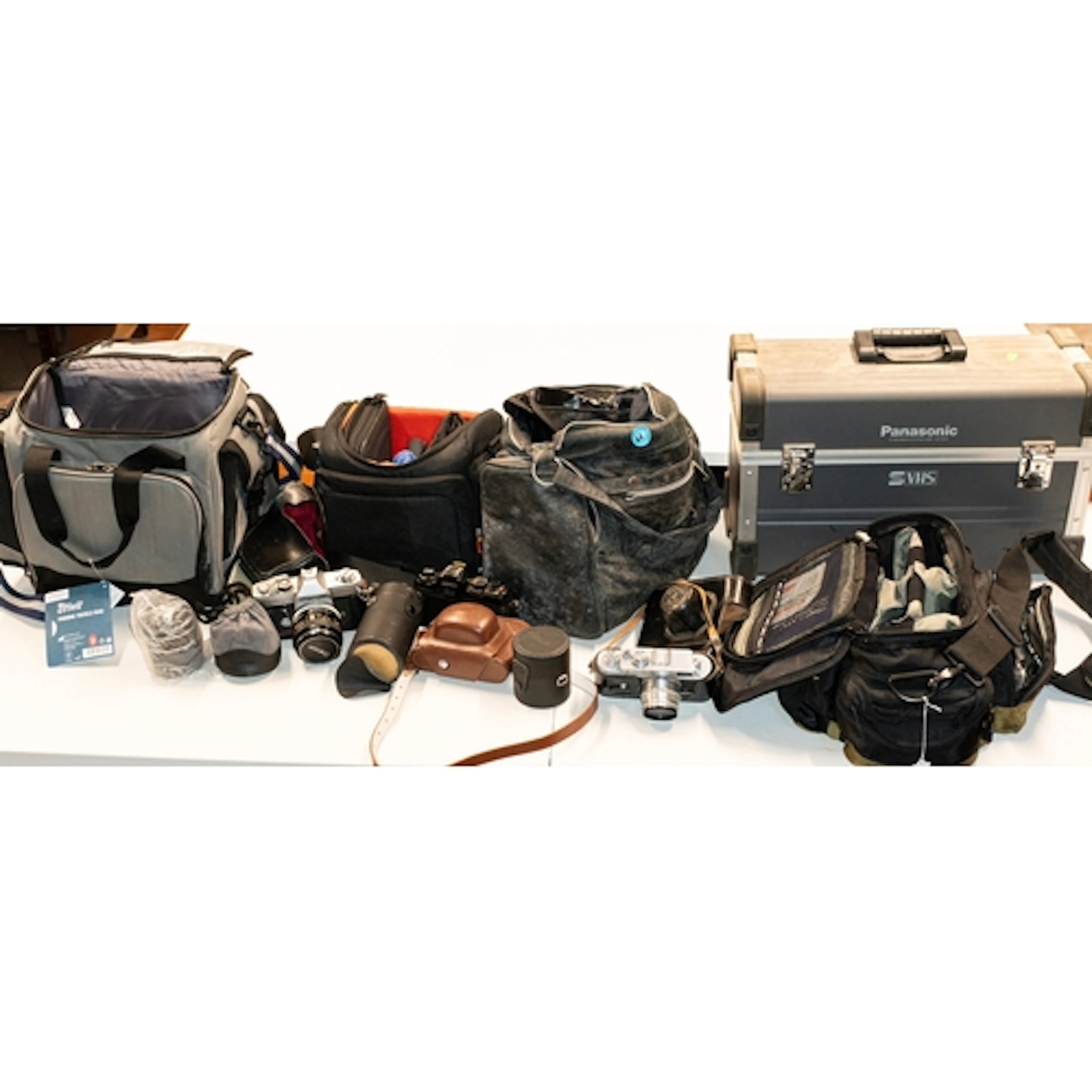 Photography: a Panasonic WS1 video camera with accessories, ...