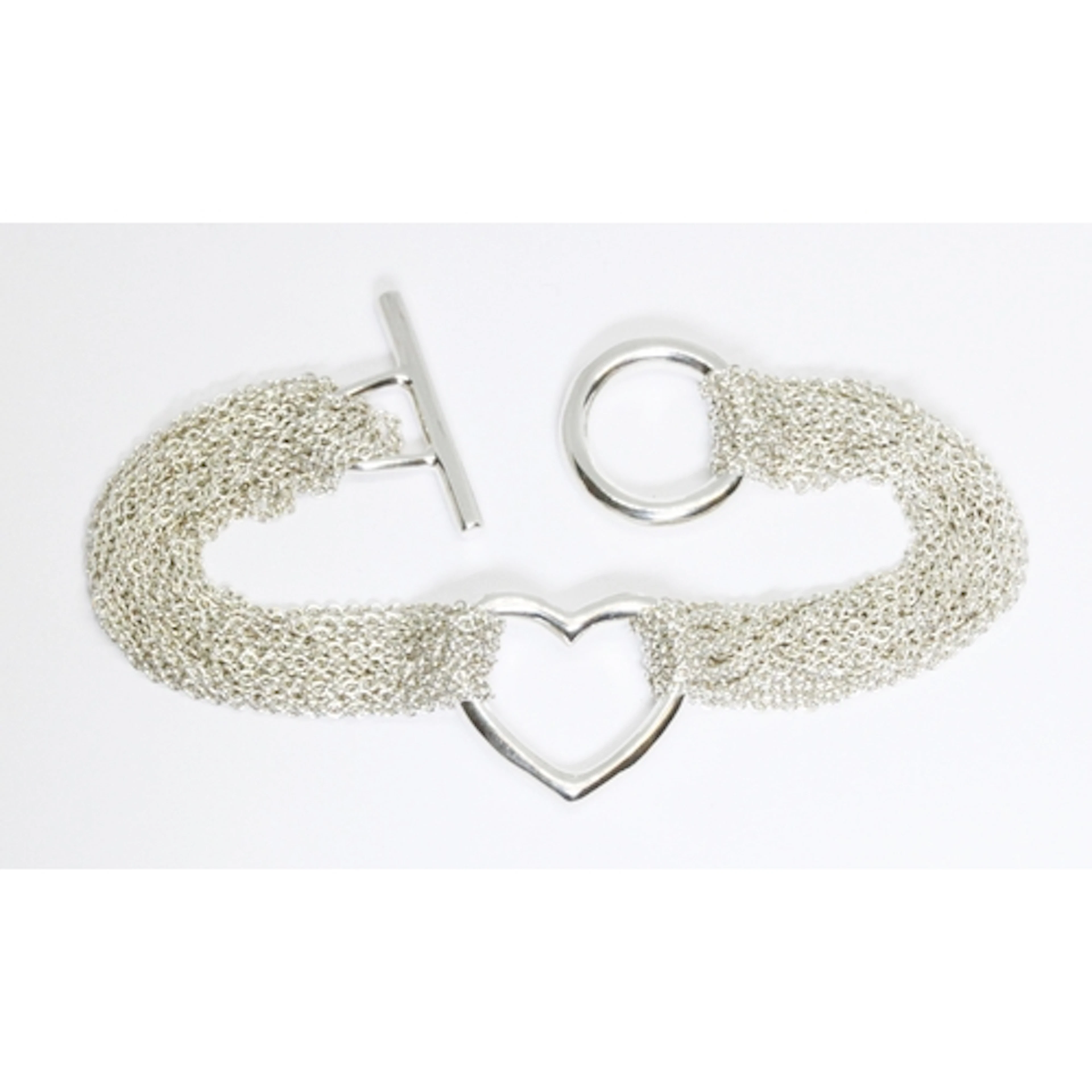 ELSA PERETTI for TIFFANY & CO, an open heart mesh toggle bra...