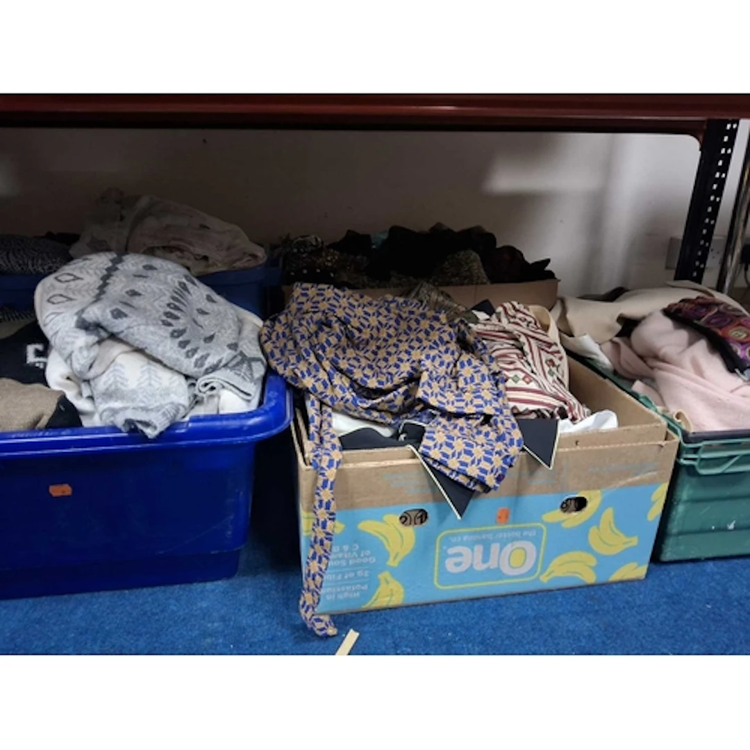 FIVE BOXES OF WOMEN'S CLOTHING to include various jumpers to...
