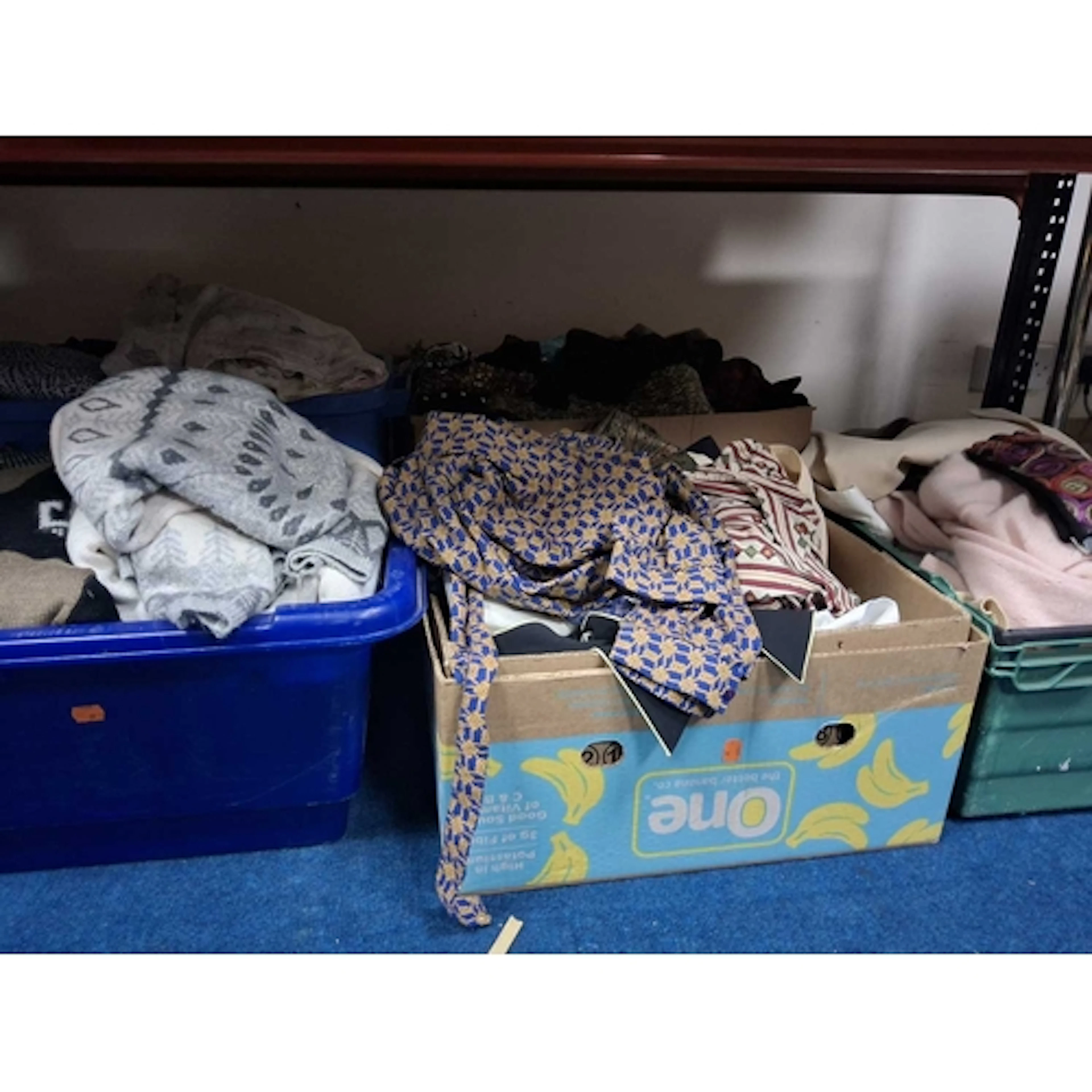 FIVE BOXES OF WOMEN'S CLOTHING to include various jumpers to...